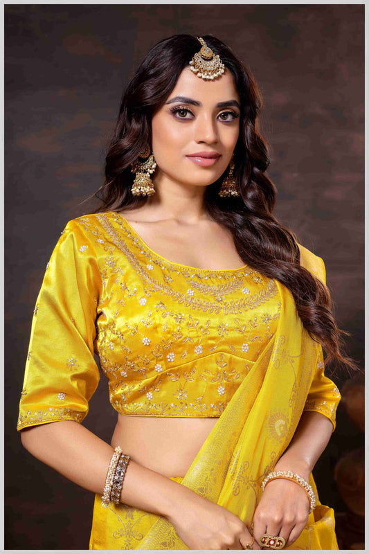 Graceful mustard Banarasi Silk Saree with Zari Accents & Embroidered Blouse