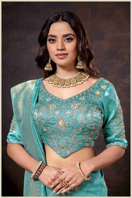 Vibrant Dusty blue Zari Banarasi Silk Saree with Embroidered Stitched Blouse