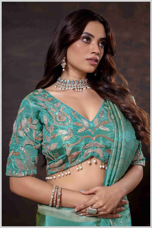 Elegant Aqua Green Designer Tissue Saree with Embellished Blouse.