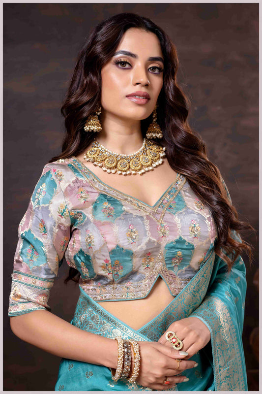 Ethereal Aqua Blue Crepe Silk Saree with Brocade Blouse & Zari Detailing