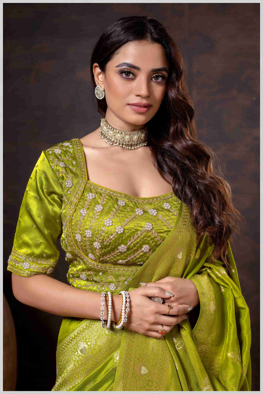 Regal Mehendi Zari Woven Silk Saree with Stitched Designer Blouse.