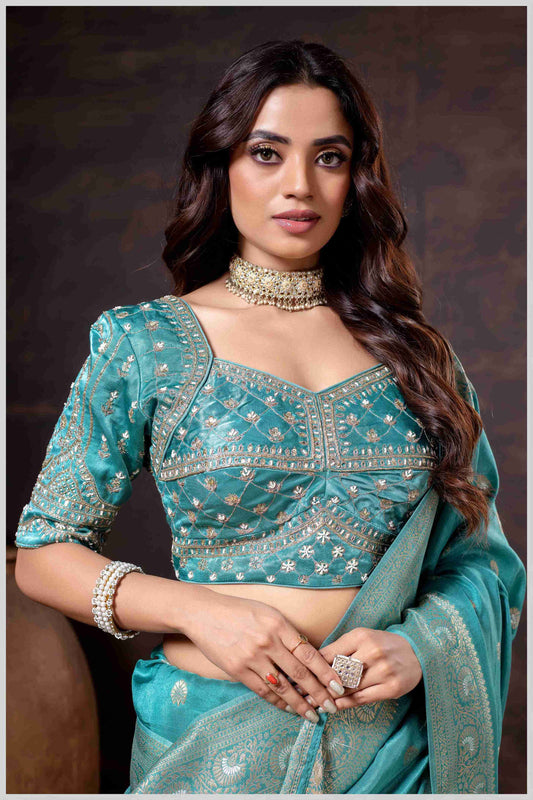 Charming Turquoise Banarasi Silk Saree with Embroidered Designer Blouse