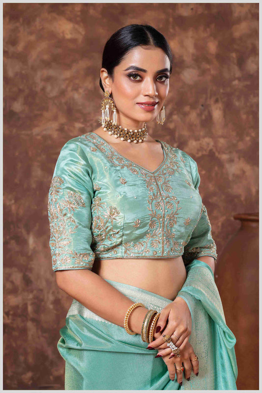 Zari Elegance in Dusty Blue Majesty Tissue Saree With Blouse.