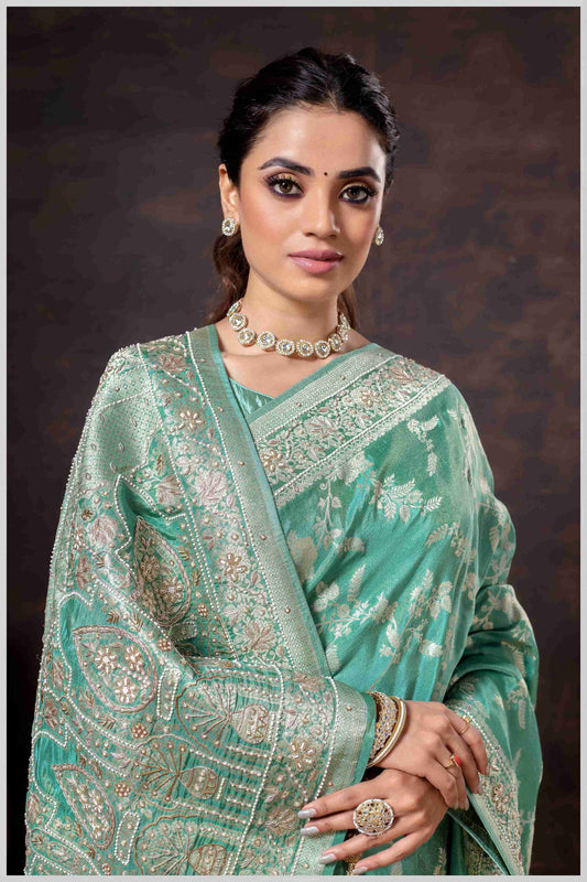 Grace in Bloom: Aqua Green Tissue Saree with Woven Floral Vines