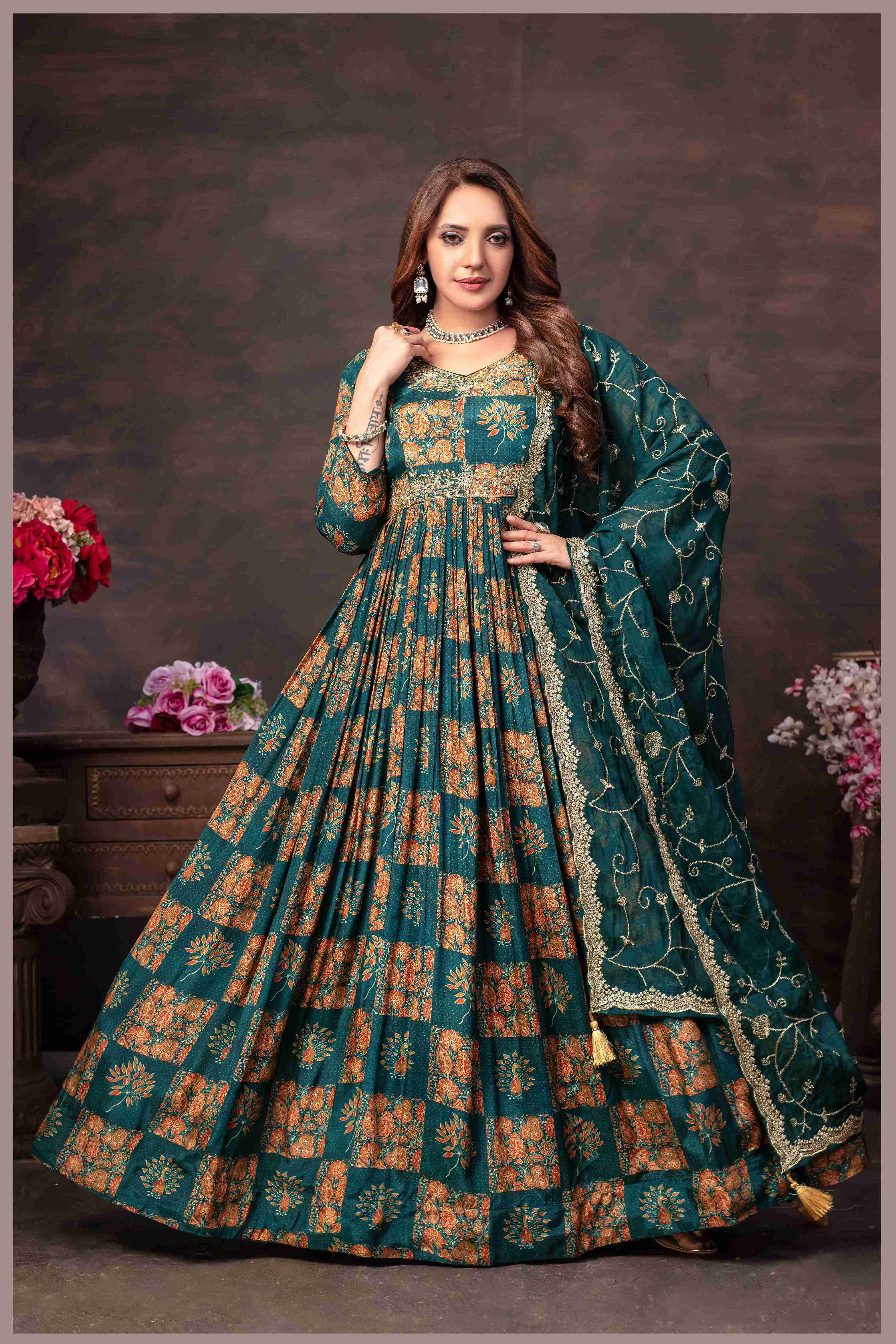 Emerald Green Muslin Printed Gown with Embroidered Net Dupatta Emerald Green Muslin Printed Gown with Embroidered Net Dupatta
