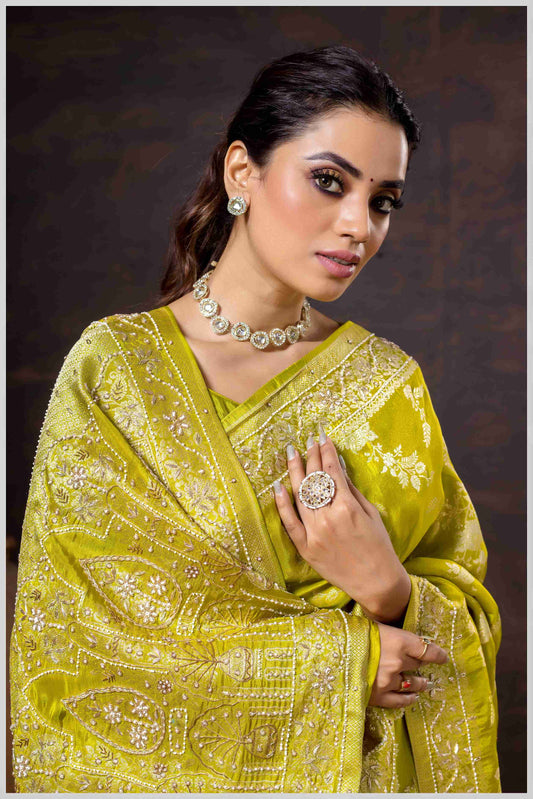 Grace in Bloom: Yellow Tissue Saree with Woven Floral Vines