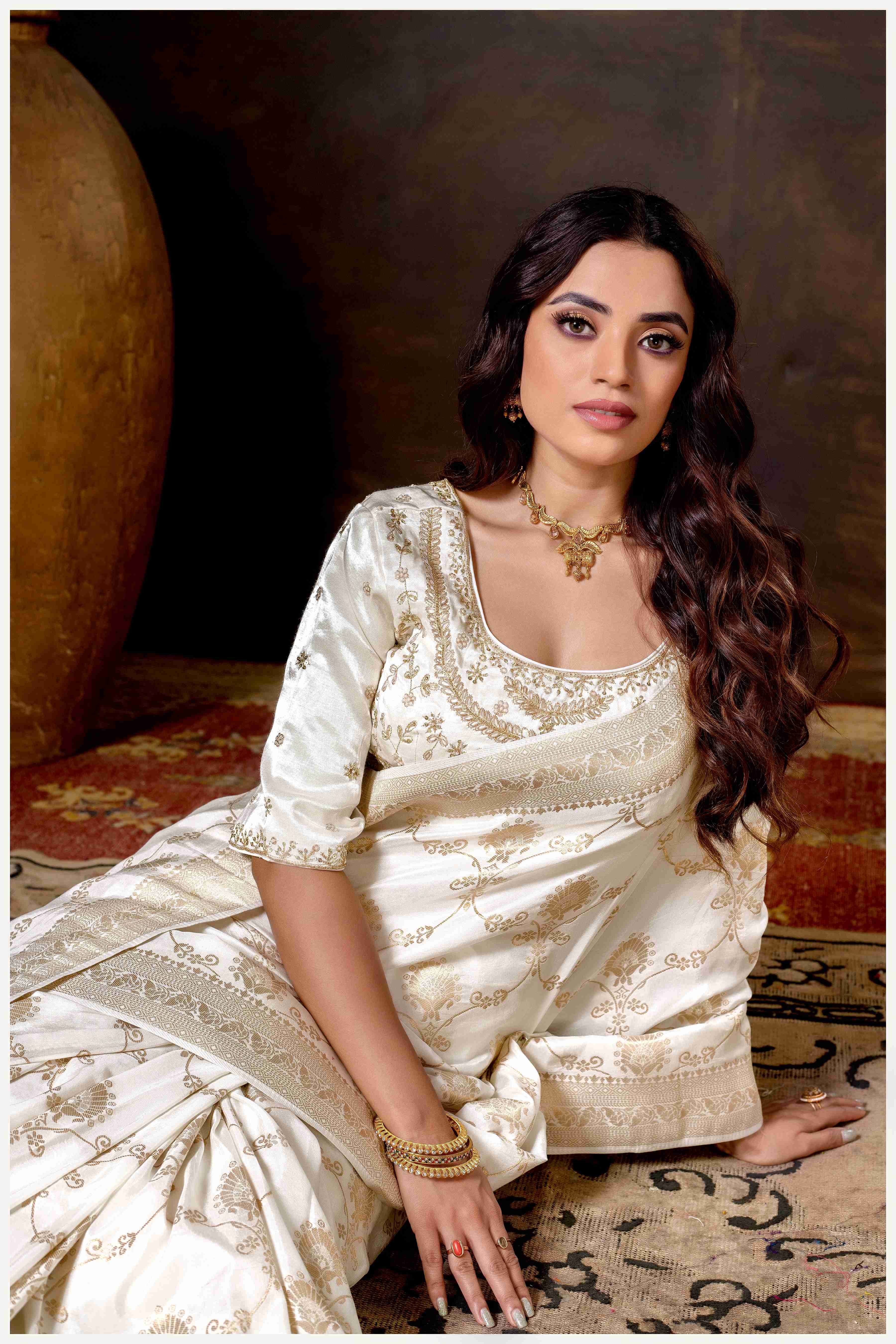 Graceful off-white Banarasi Silk Saree with Zari Accents & Embroidered Blouse