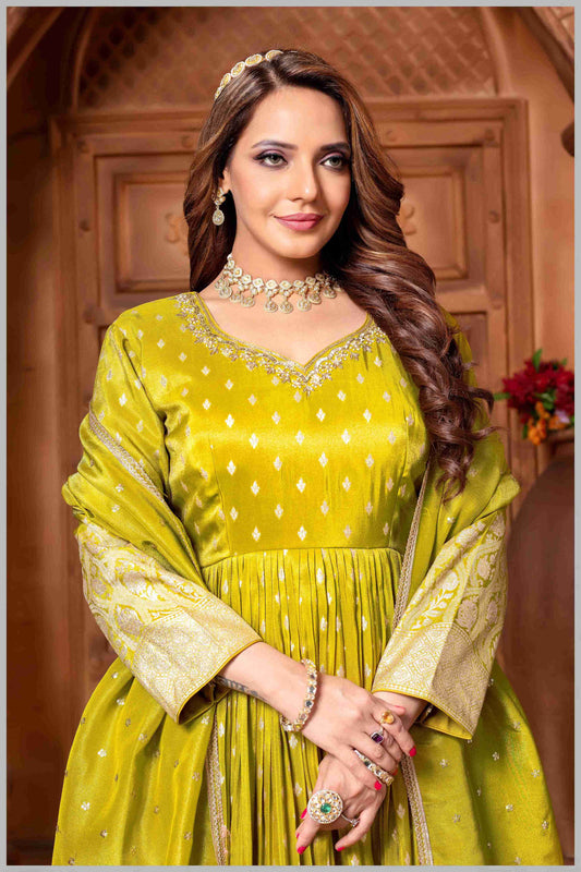 Radiate Grace in This Timeless Mehendi Tissue Silk Anarkali Gown