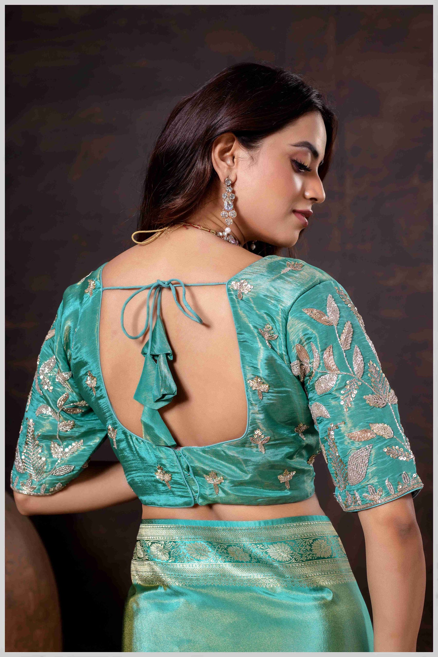Elegant Aqua Green Designer Tissue Saree with Embellished Blouse.