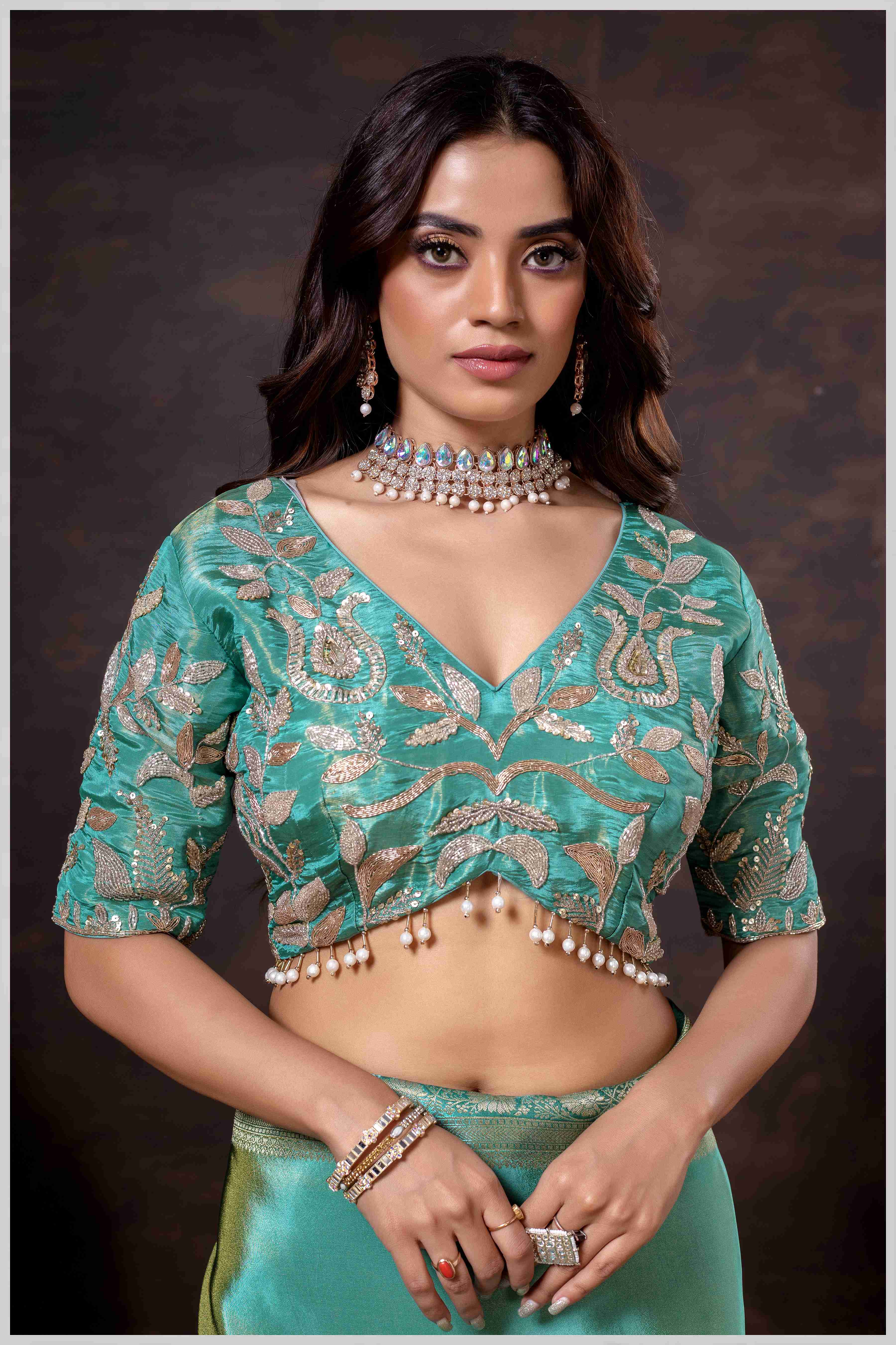 Elegant Aqua Green Designer Tissue Saree with Embellished Blouse.