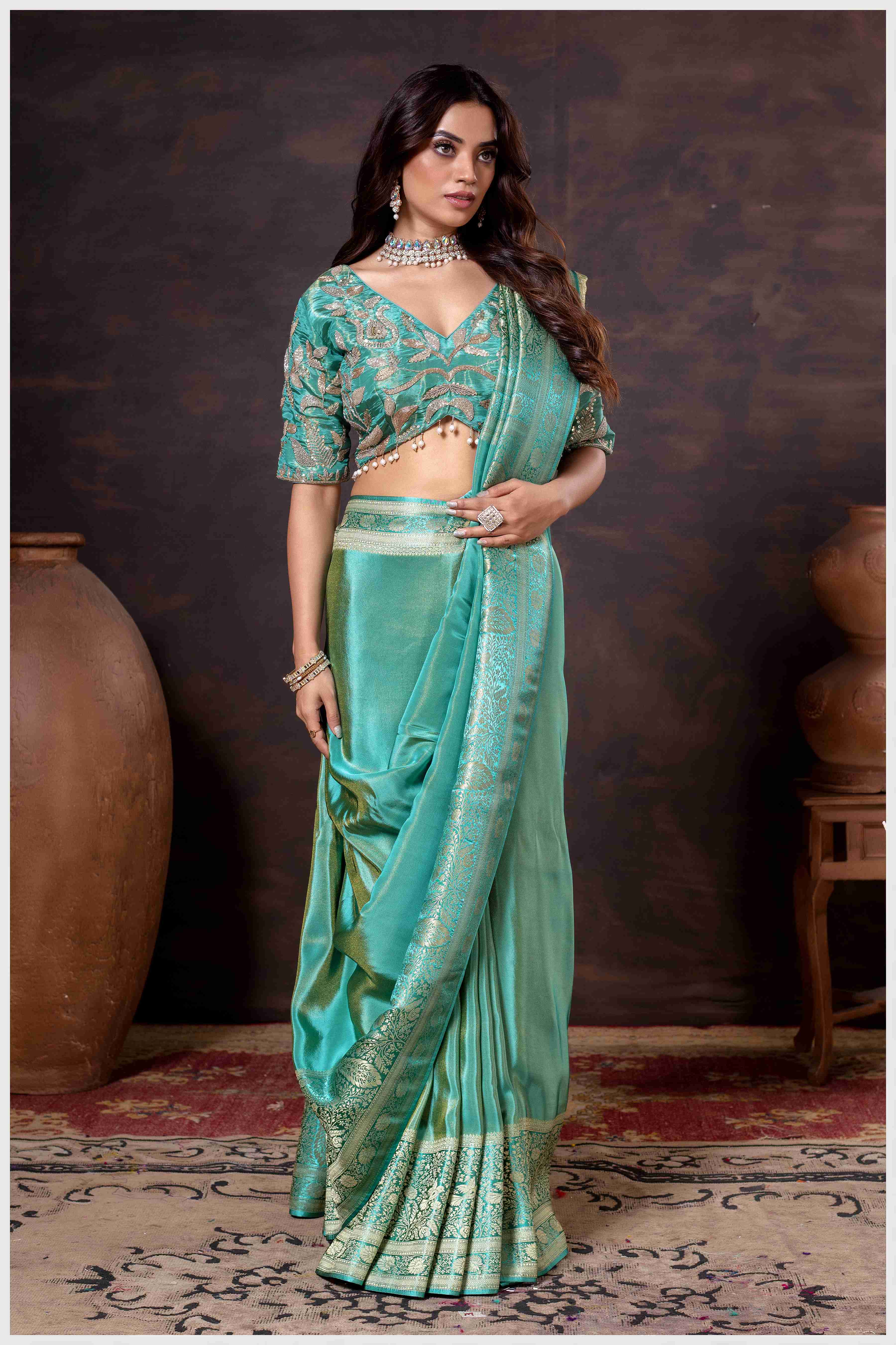 Elegant Aqua Green Designer Tissue Saree with Embellished Blouse.