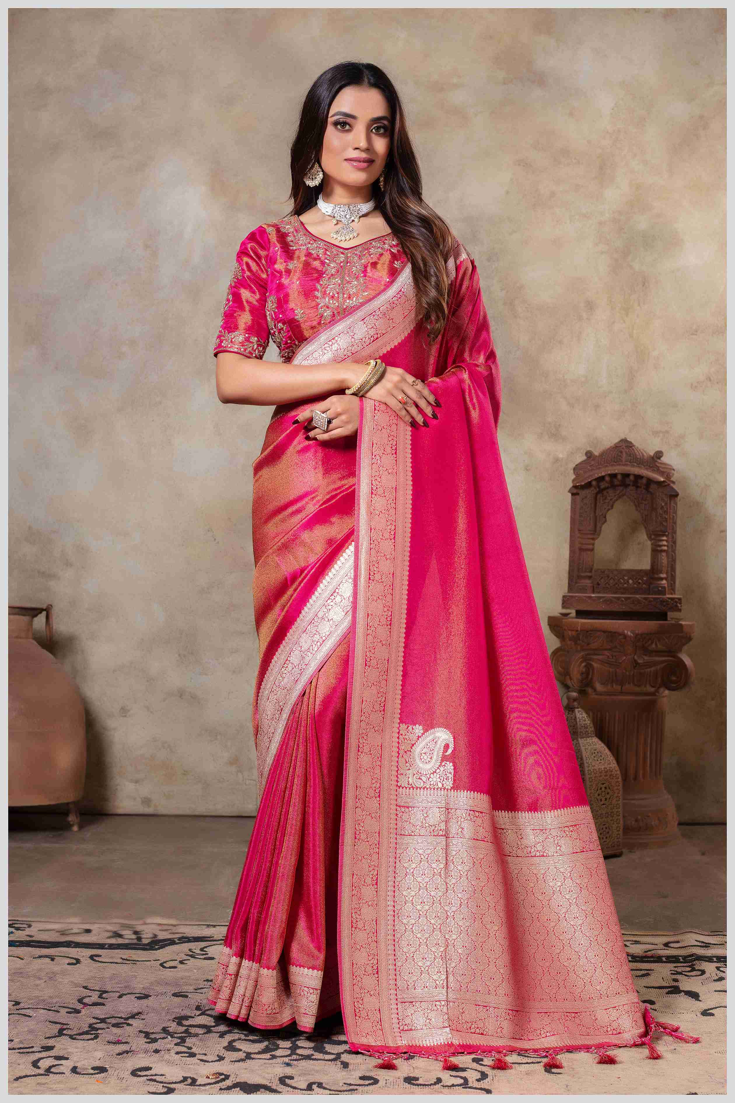 Zari Elegance in Pink Tissue Saree With Work Blouse.