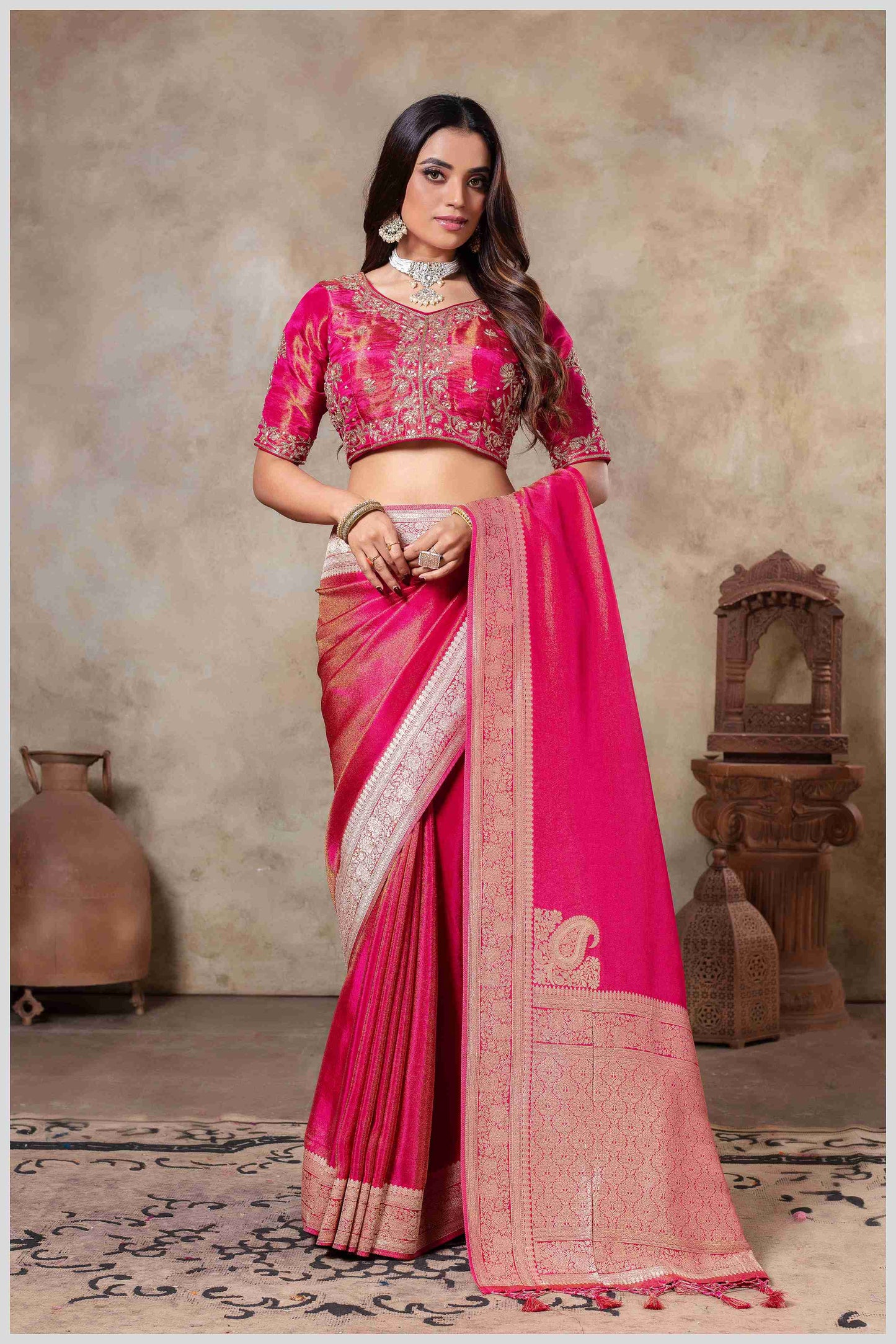 Zari Elegance in Pink Tissue Saree With Work Blouse.