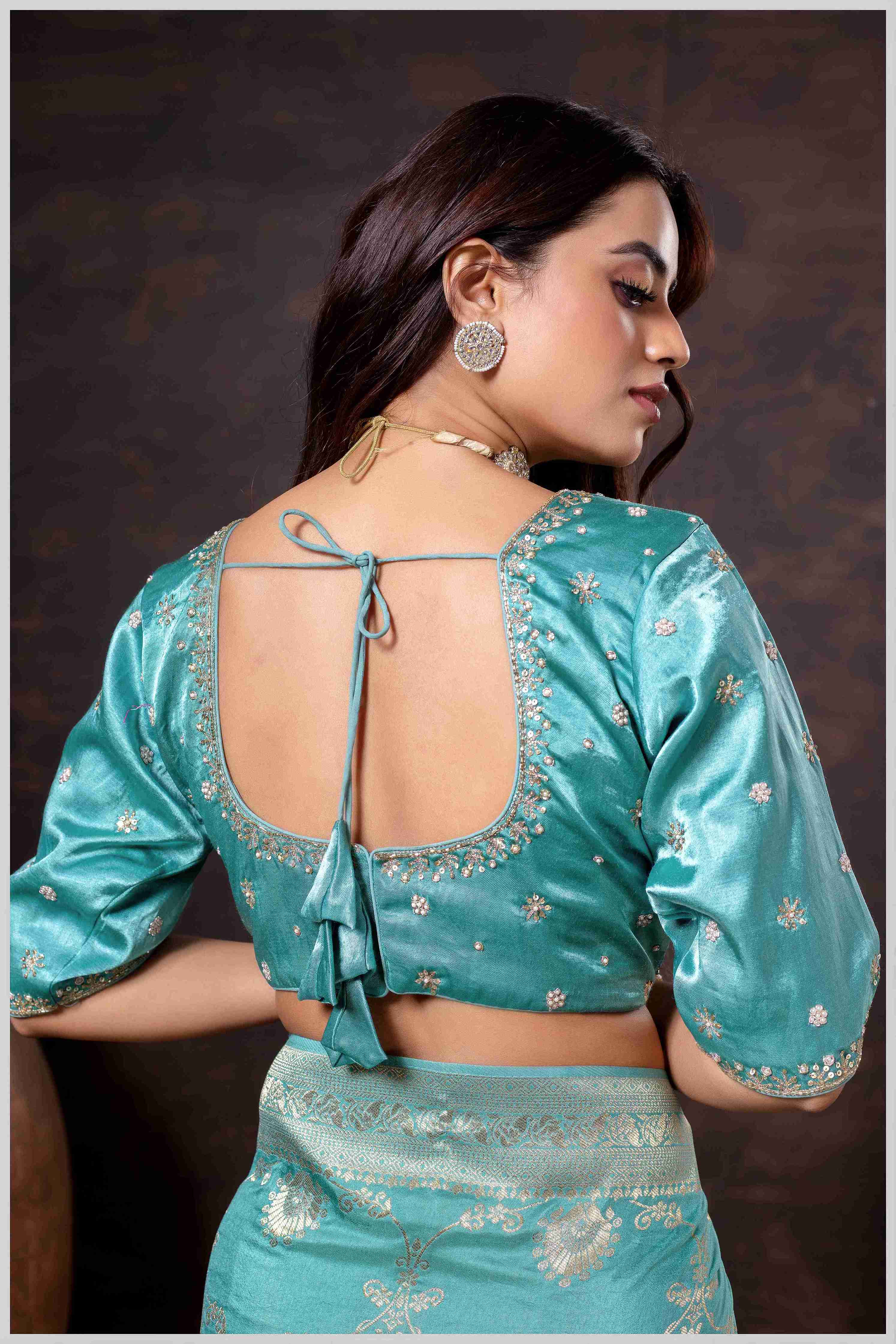 Graceful Aqua Blue Banarasi Silk Saree with Zari Accents & Embroidered Blouse
