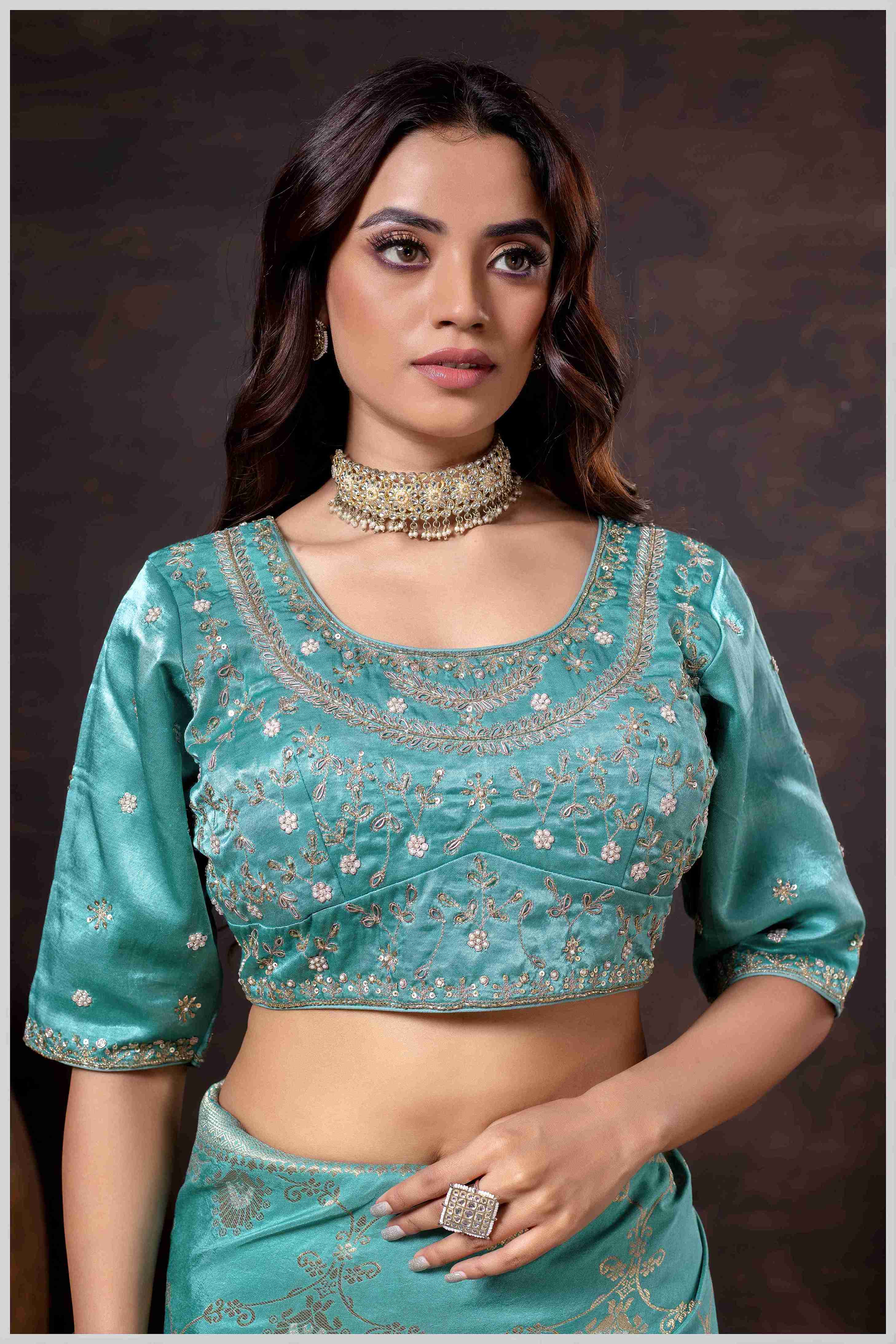 Graceful Aqua Blue Banarasi Silk Saree with Zari Accents & Embroidered Blouse