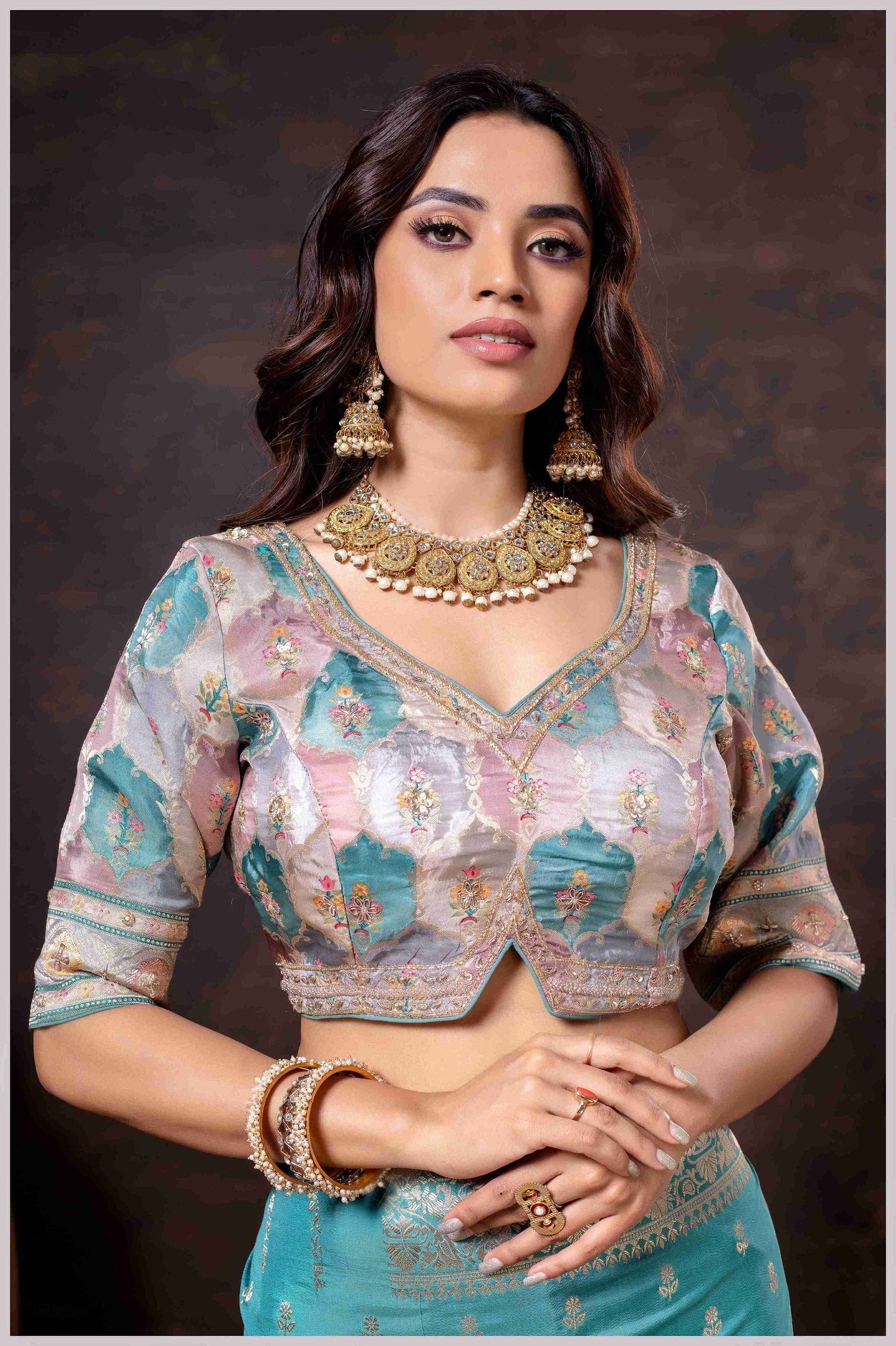 Ethereal Aqua Blue Crepe Silk Saree with Brocade Blouse & Zari Detailing