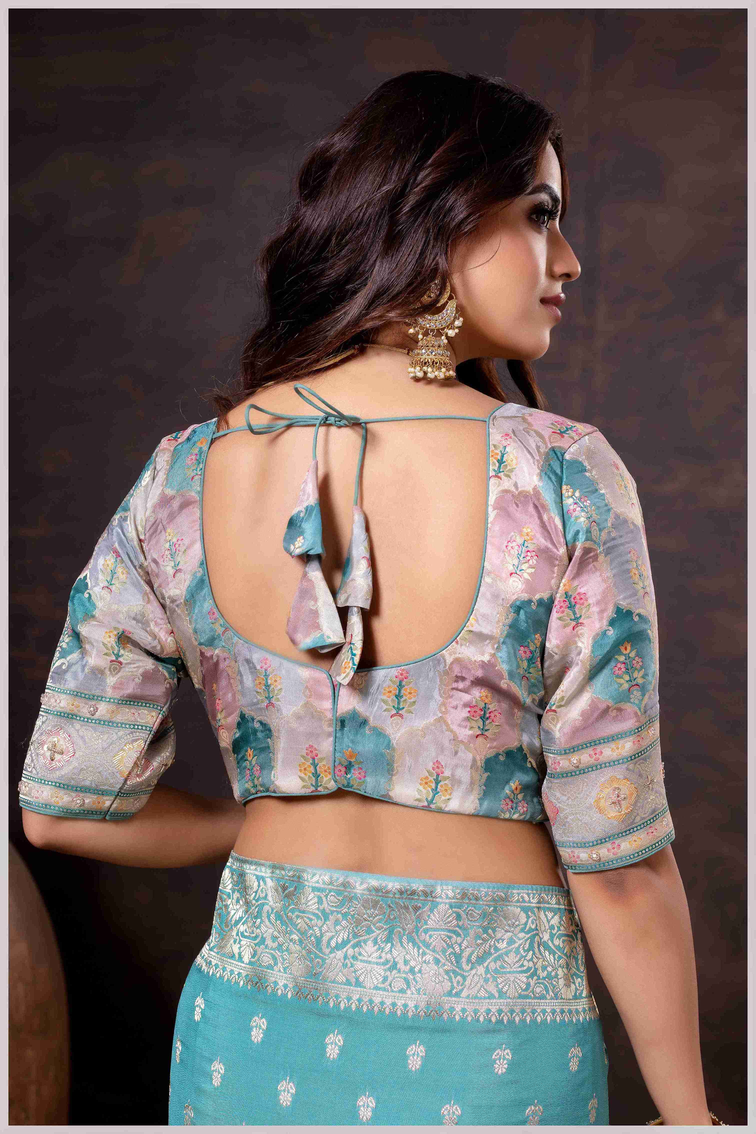 Ethereal Aqua Blue Crepe Silk Saree with Brocade Blouse & Zari Detailing