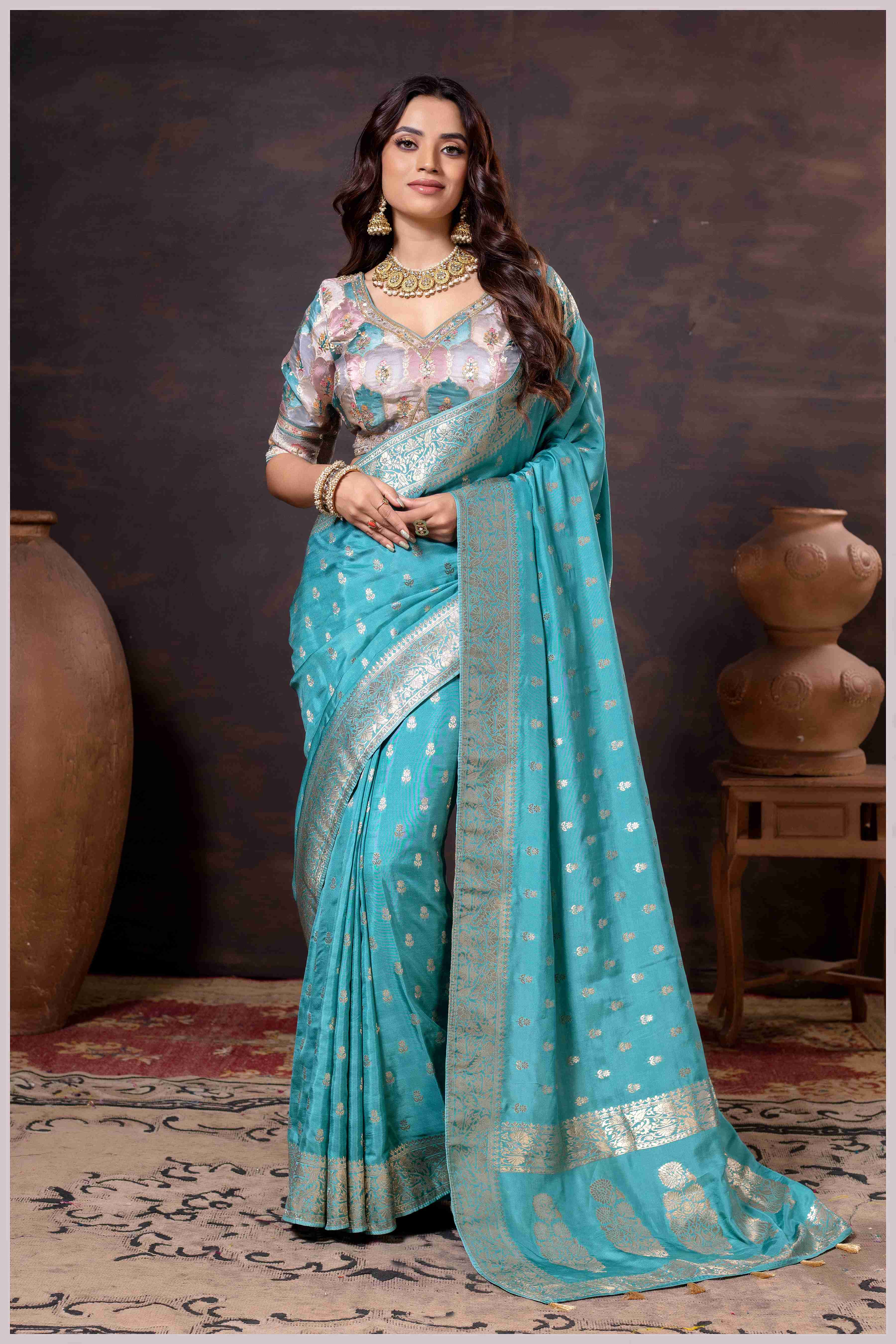Ethereal Aqua Blue Crepe Silk Saree with Brocade Blouse & Zari Detailing