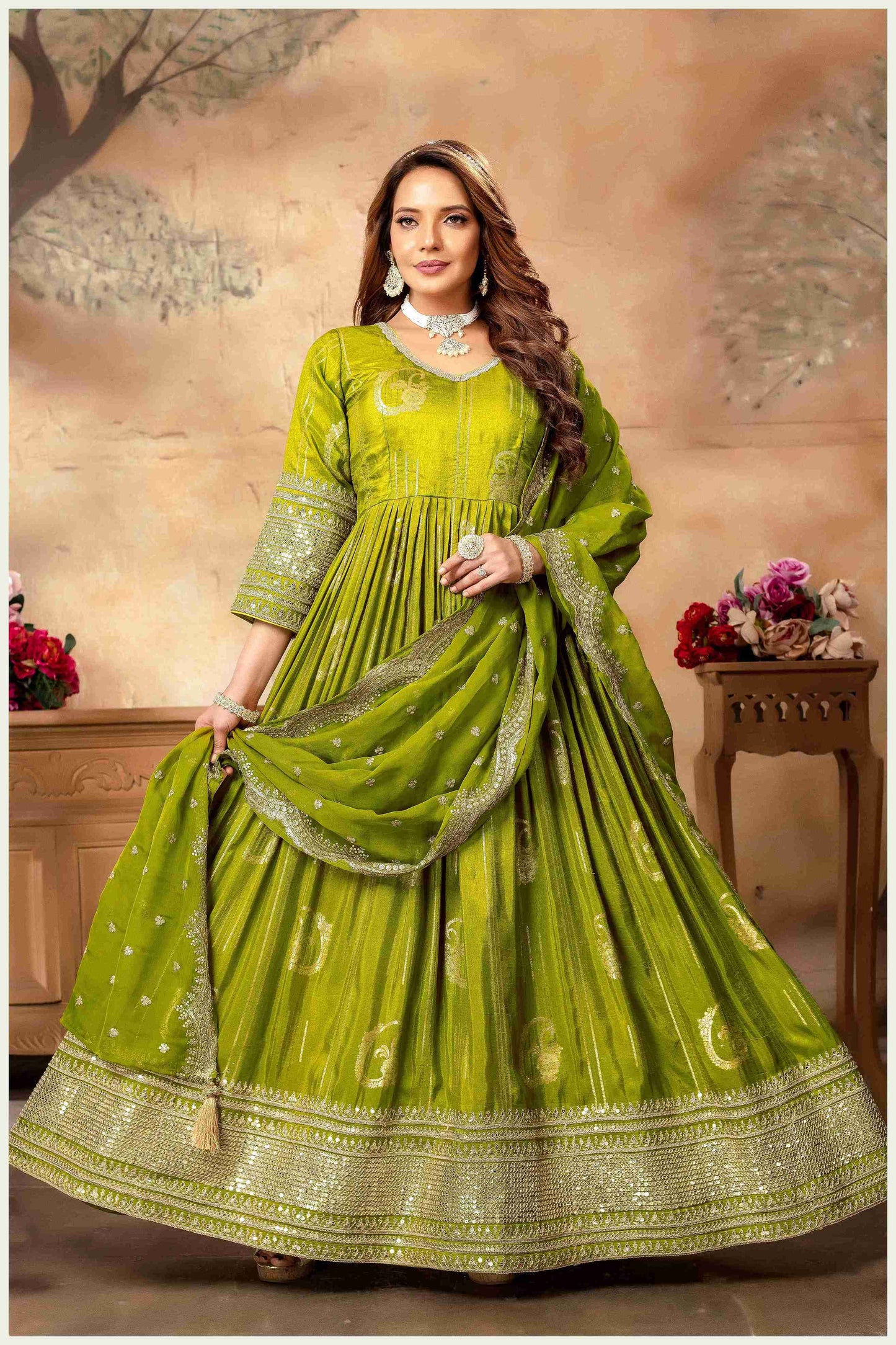 the Spotlight in This Vibrant Green Silk Anarkali Gown