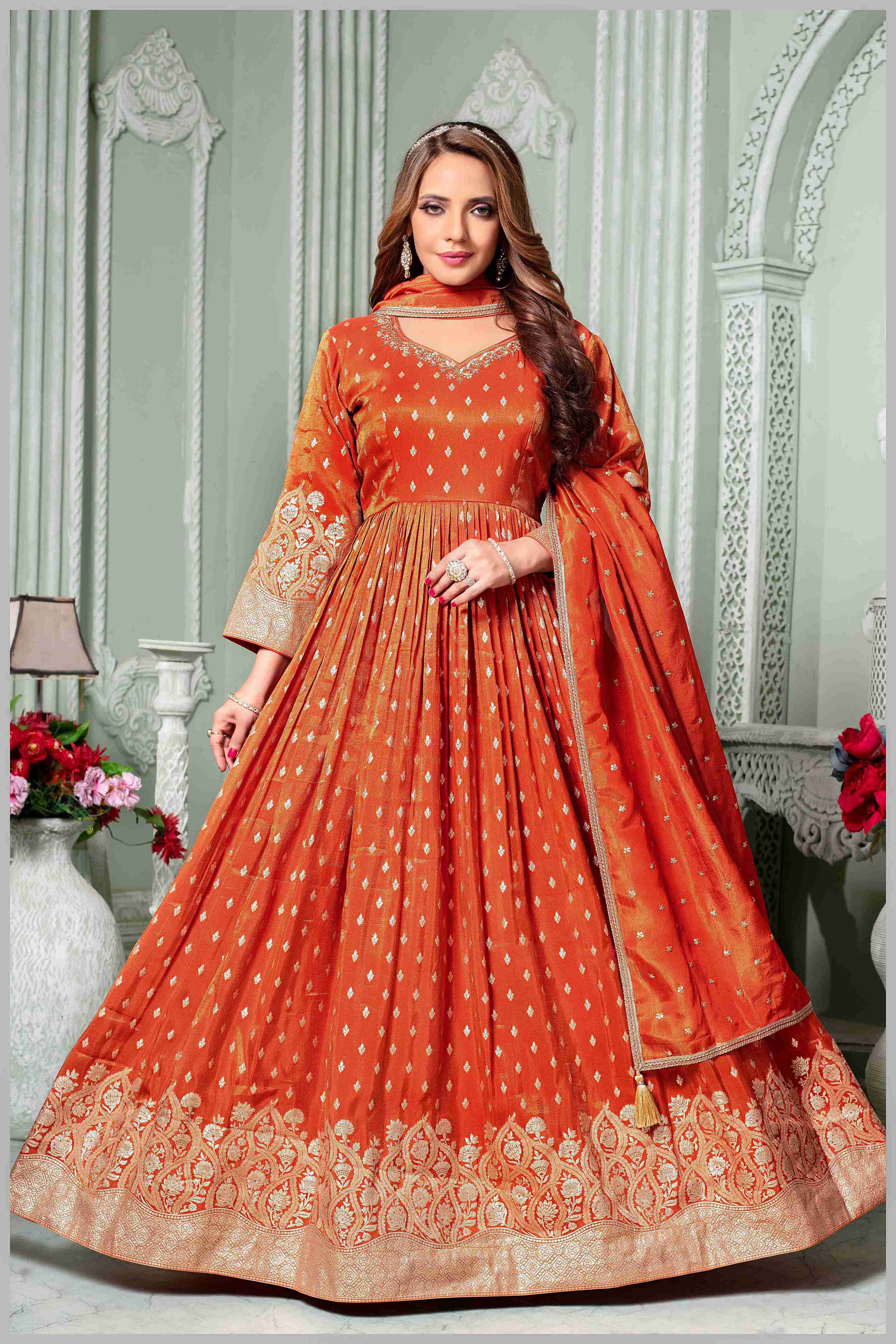 Radiate Grace in This Timeless Rust Tissue Silk Anarkali Gown