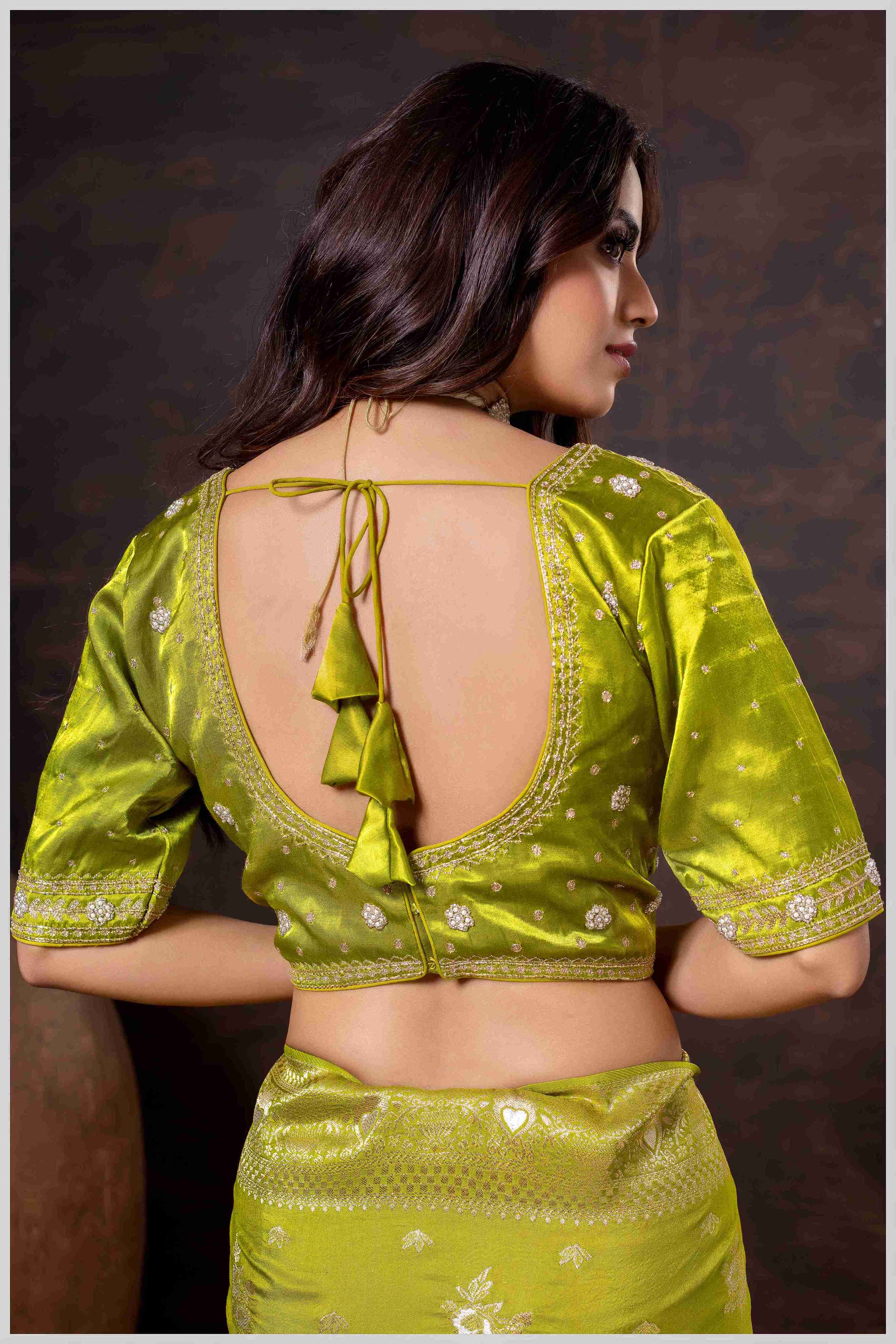 Regal Mehendi Zari Woven Silk Saree with Stitched Designer Blouse.