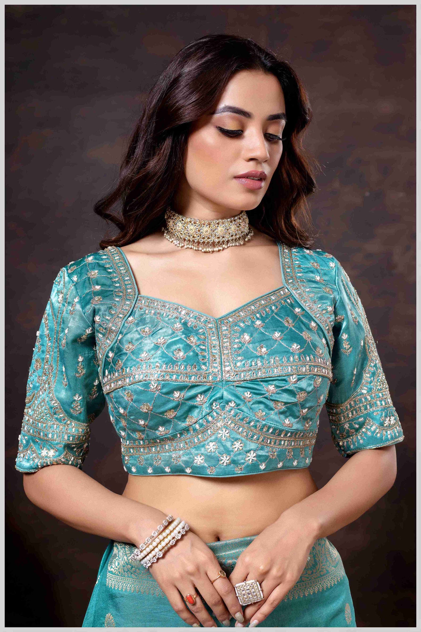 Charming Turquoise Banarasi Silk Saree with Embroidered Designer Blouse