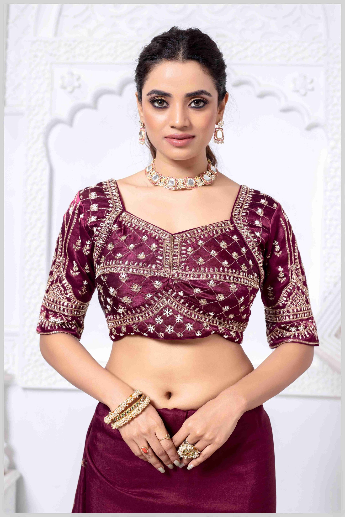 Charming Maroon Banarasi Silk Saree with Embroidered Designer Blouse.