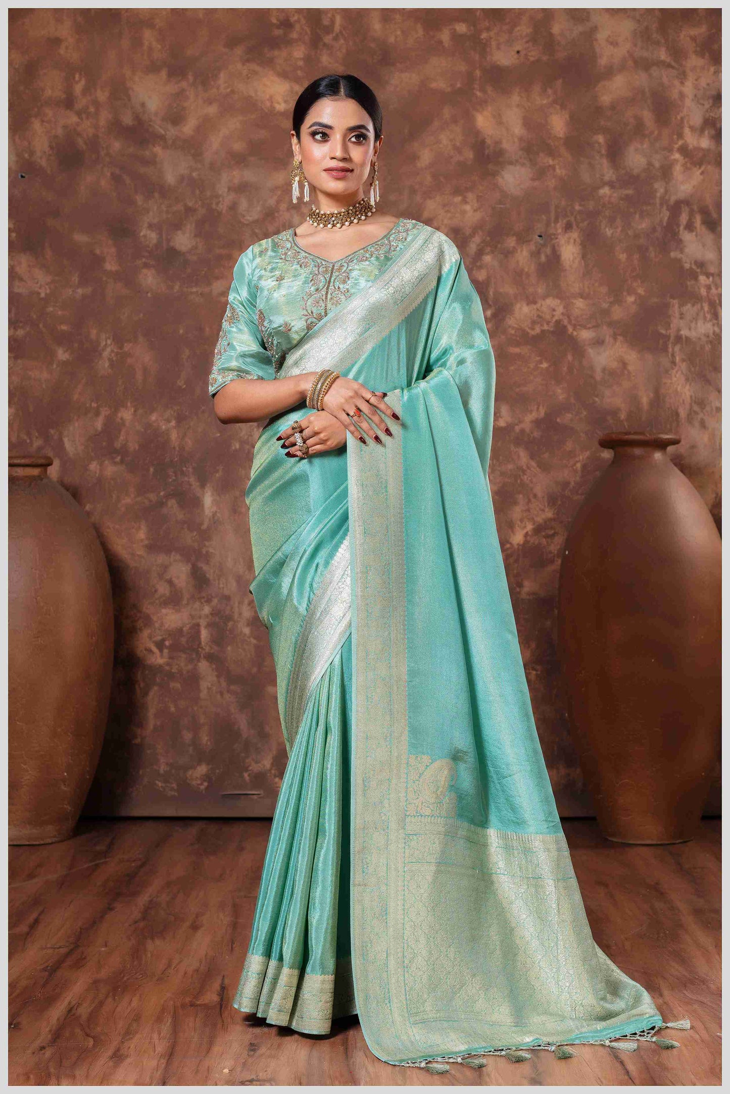 Zari Elegance in Dusty Blue Majesty Tissue Saree With Blouse.