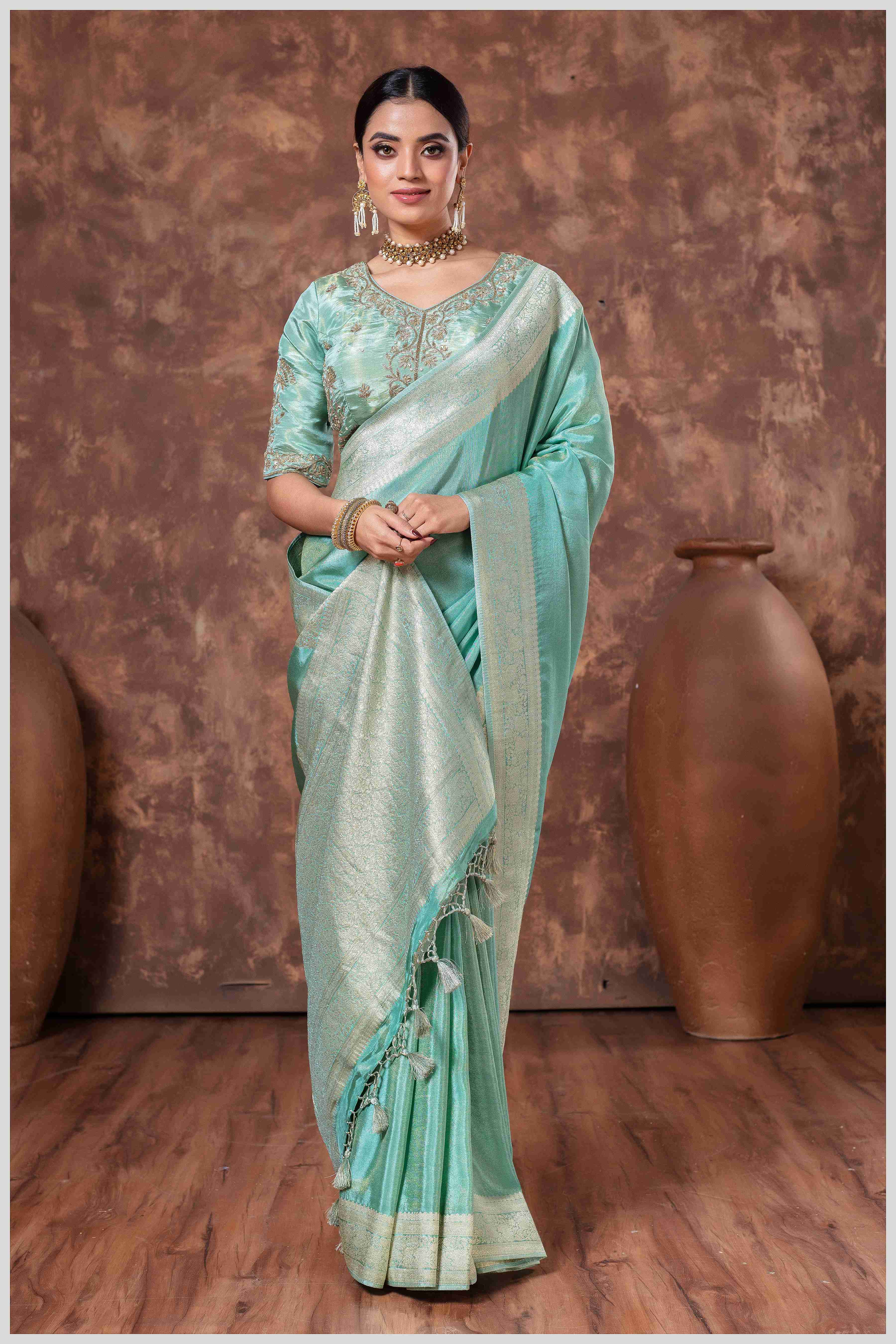 Zari Elegance in Dusty Blue Majesty Tissue Saree With Blouse.