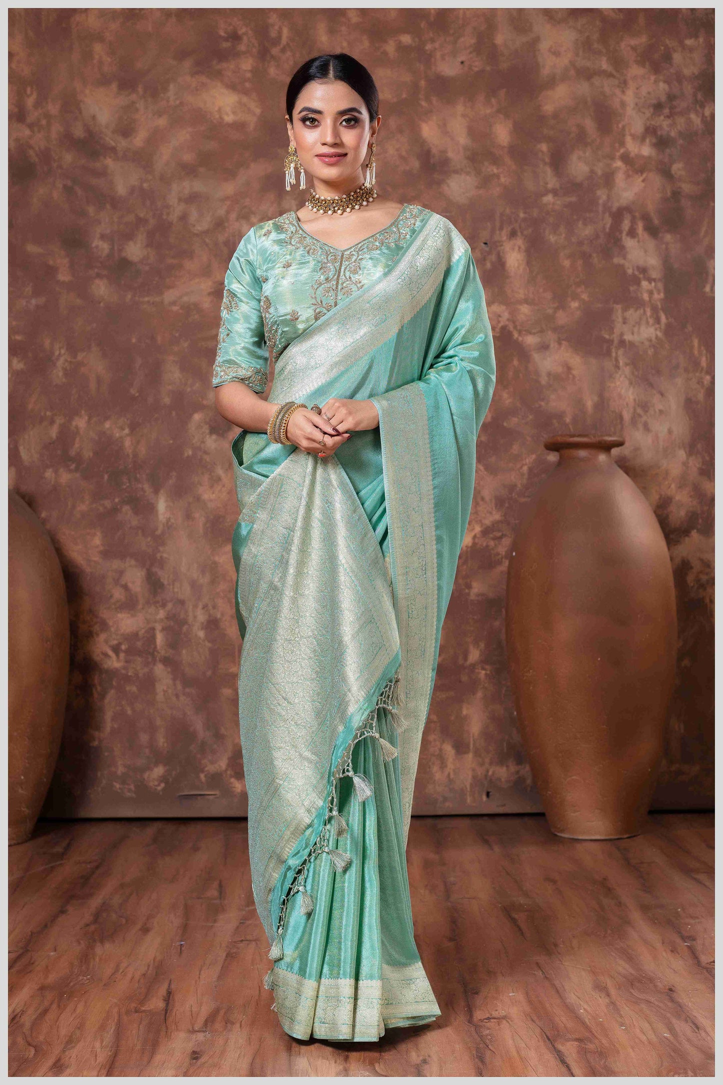 Zari Elegance in Dusty Blue Majesty Tissue Saree With Blouse.