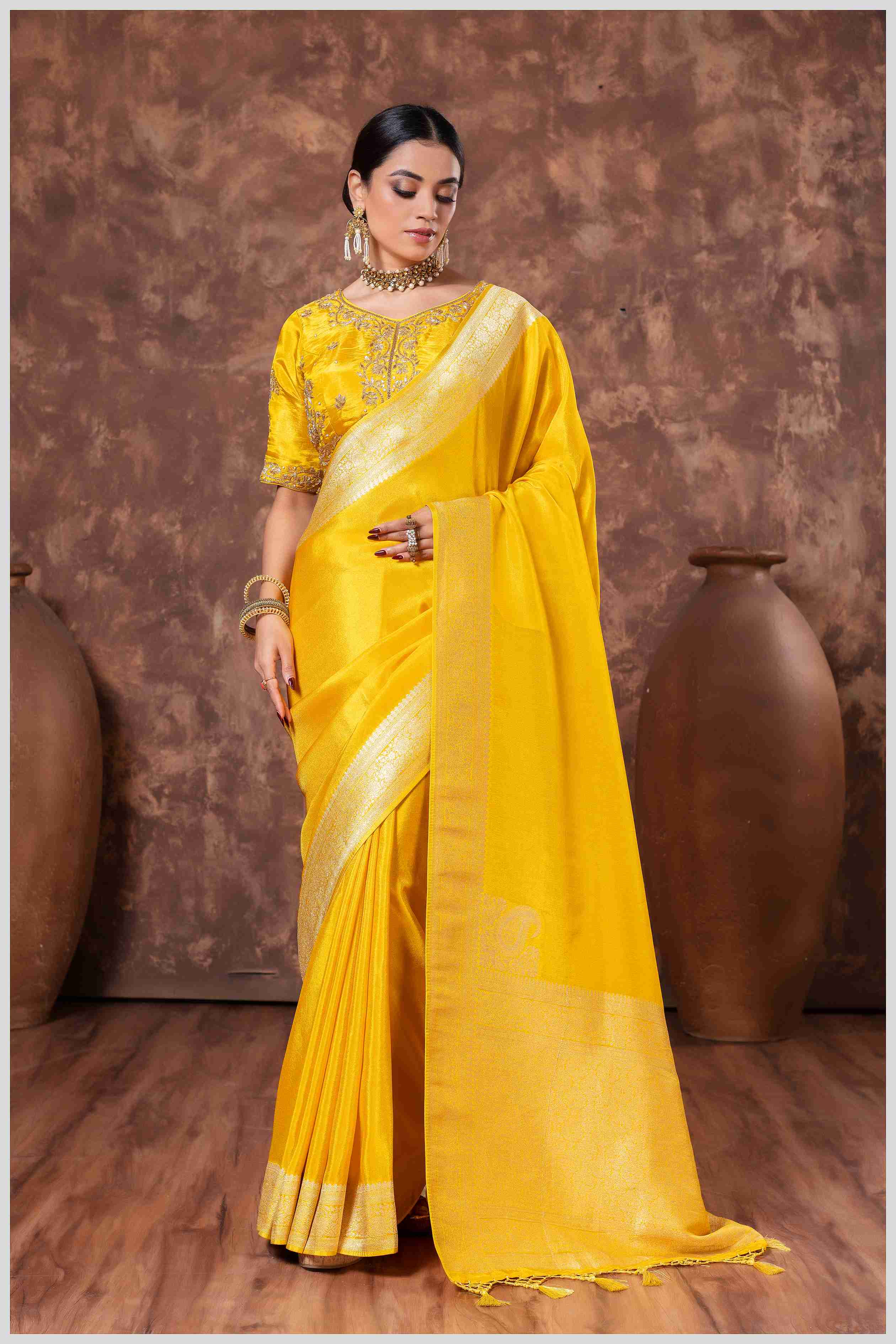Zari Elegance in Mustard Tissue Saree With Work Blouse.
