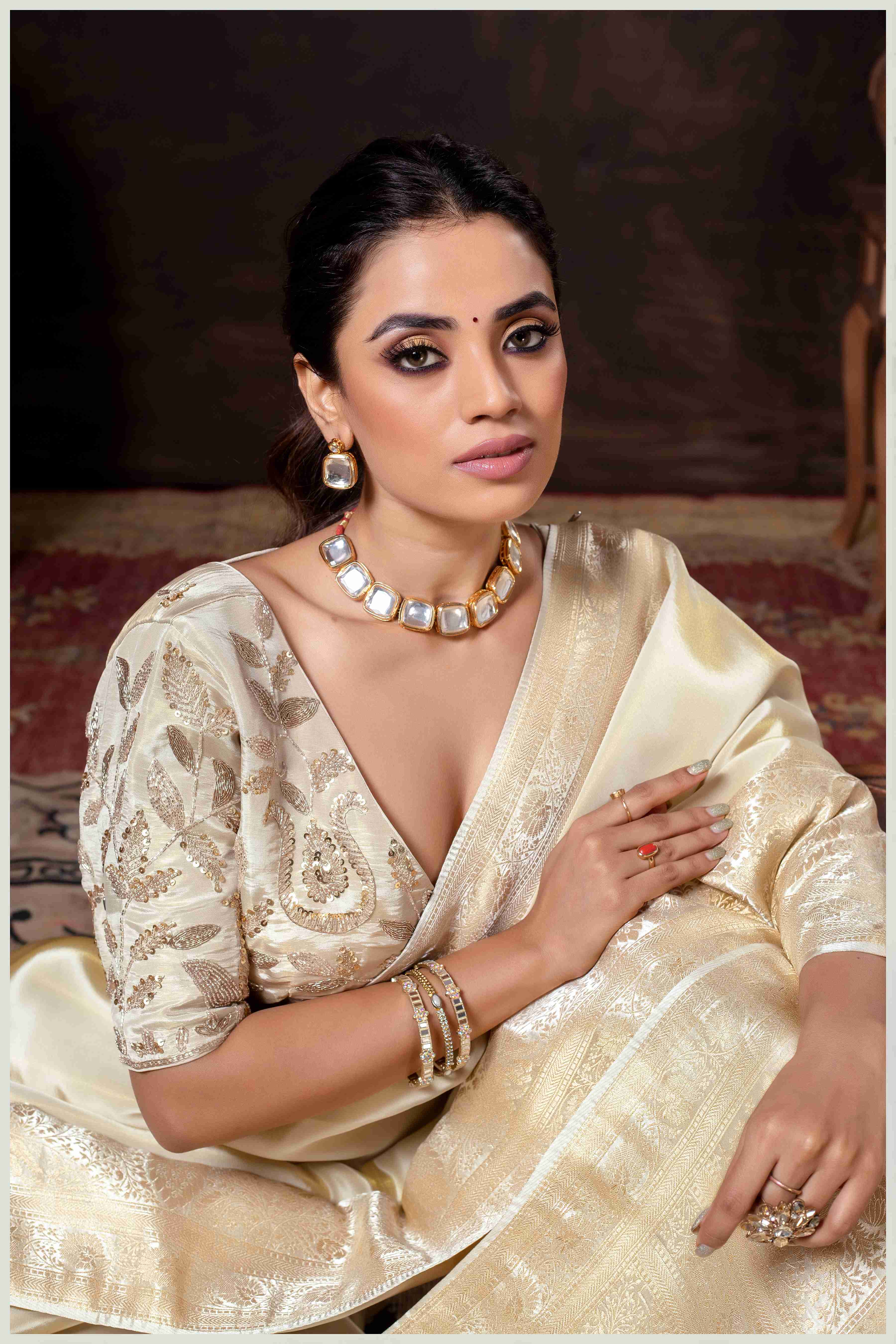 Elegant Off White Designer Tissue Saree with Embellished Blouse.