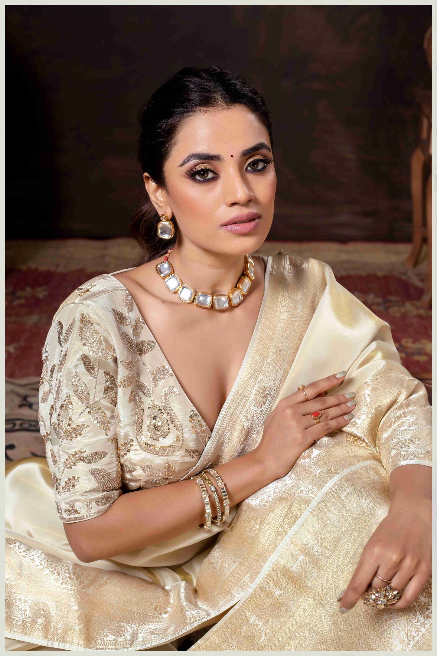 Elegant Off White Designer Tissue Saree with Embellished Blouse.