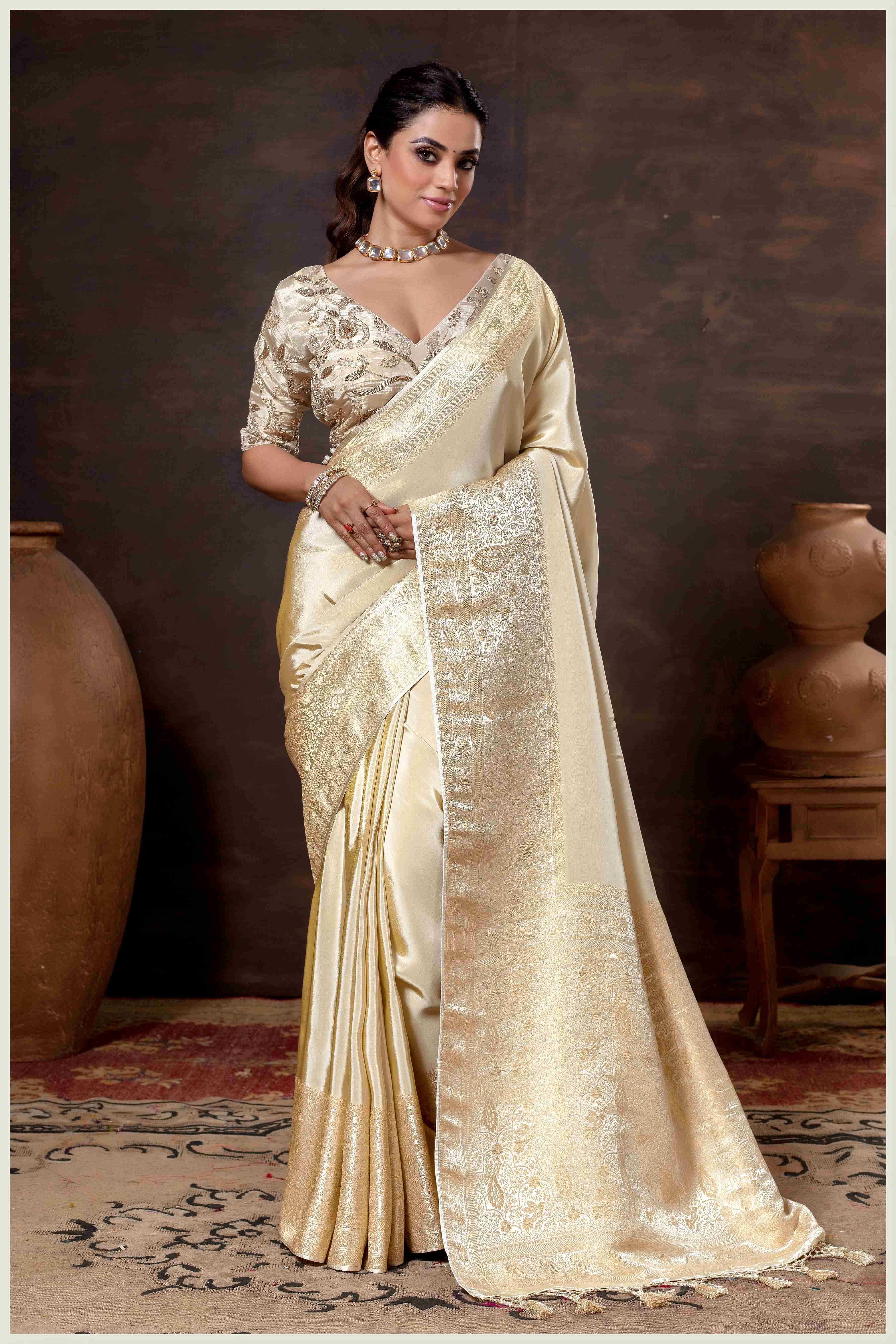 Elegant Off White Designer Tissue Saree with Embellished Blouse.