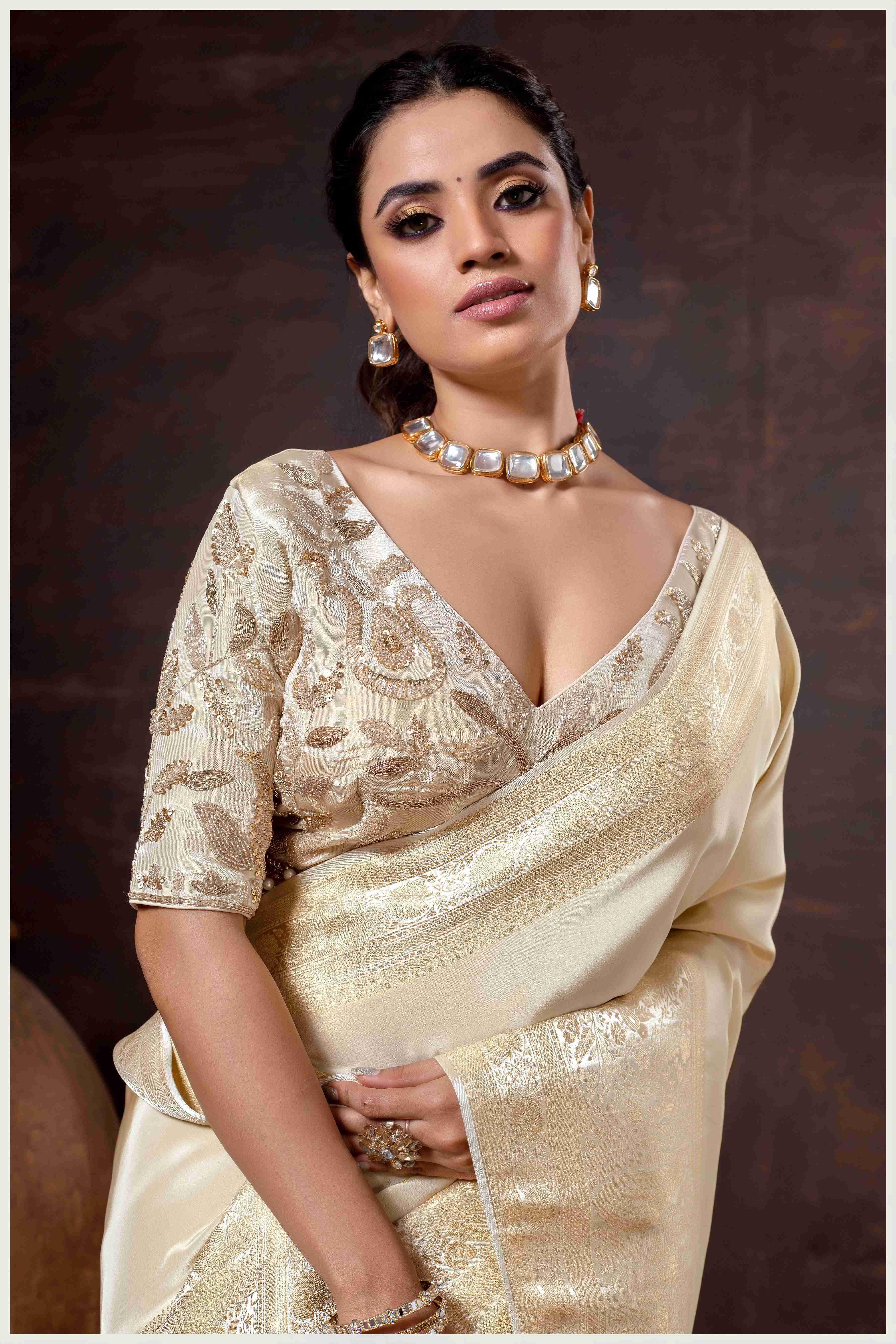 Elegant Off White Designer Tissue Saree with Embellished Blouse.