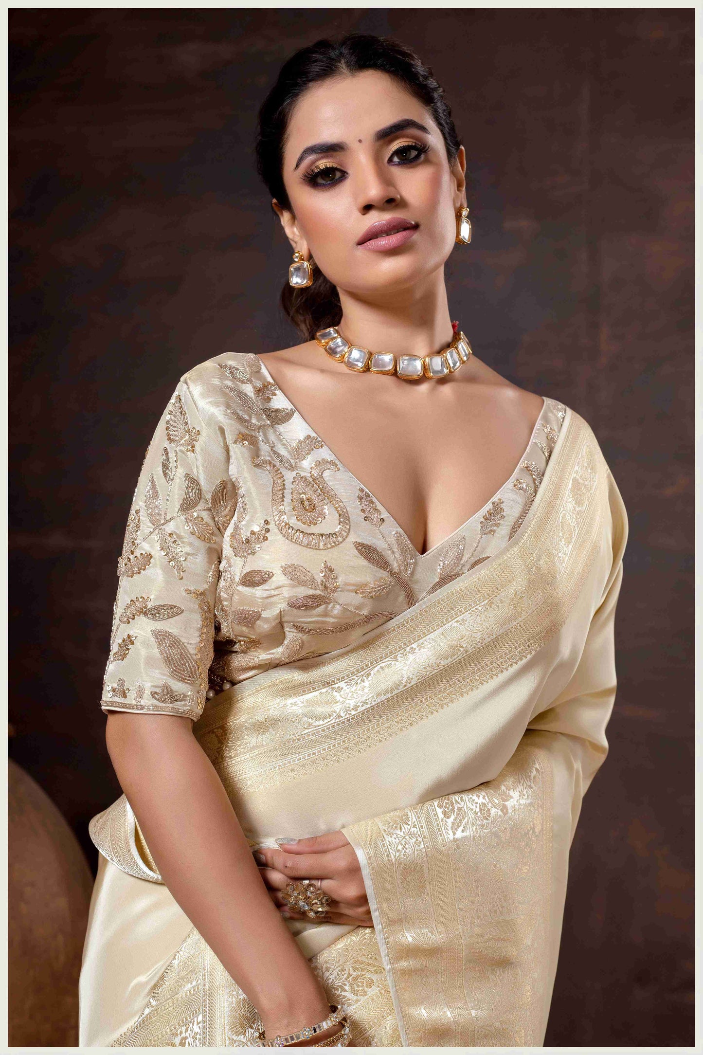 Elegant Off White Designer Tissue Saree with Embellished Blouse.