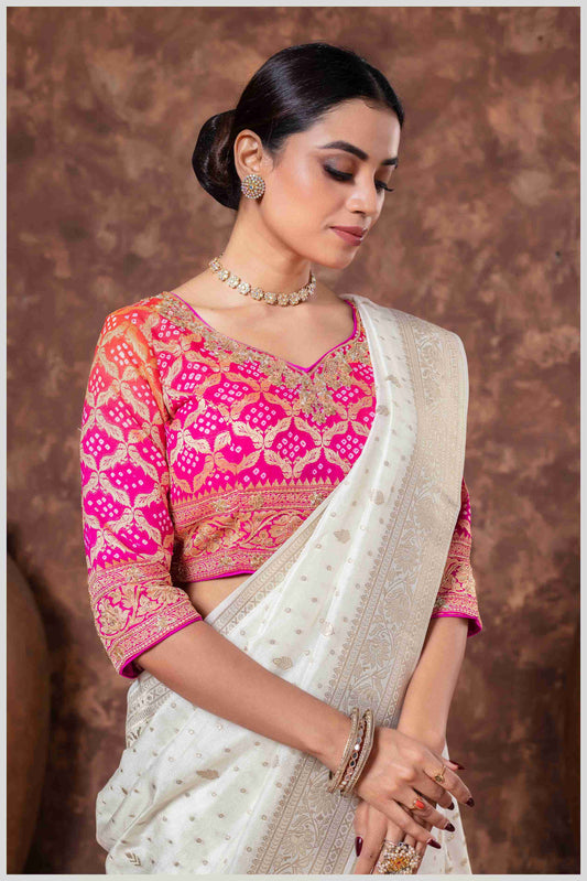 Royal Radiance: Off White Banarasi Saree & Pink Blouse with Silver Zari Detailing