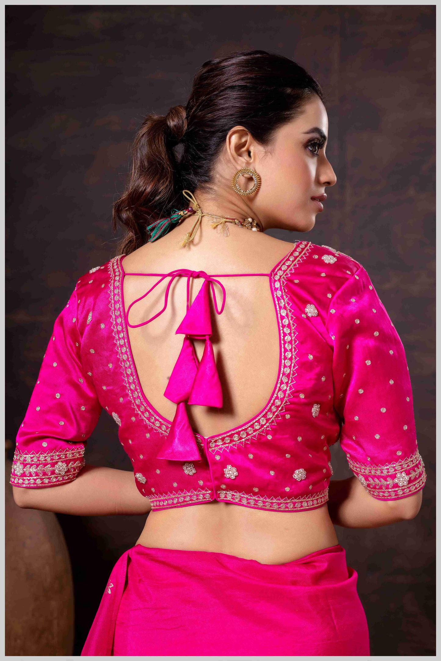 Regal Dark Pink Zari Woven Silk Saree with Stitched Designer Blouse.