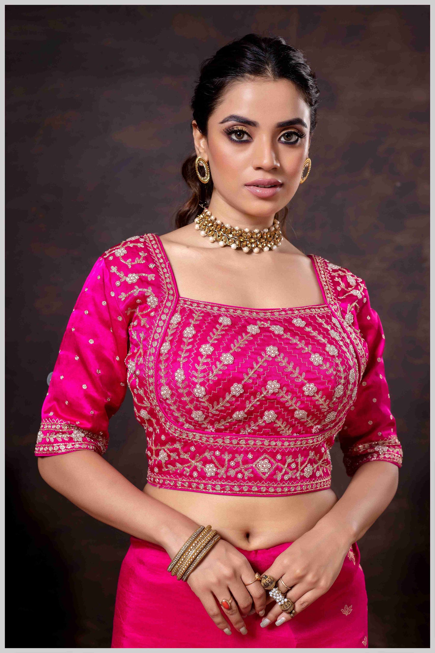 Regal Dark Pink Zari Woven Silk Saree with Stitched Designer Blouse.