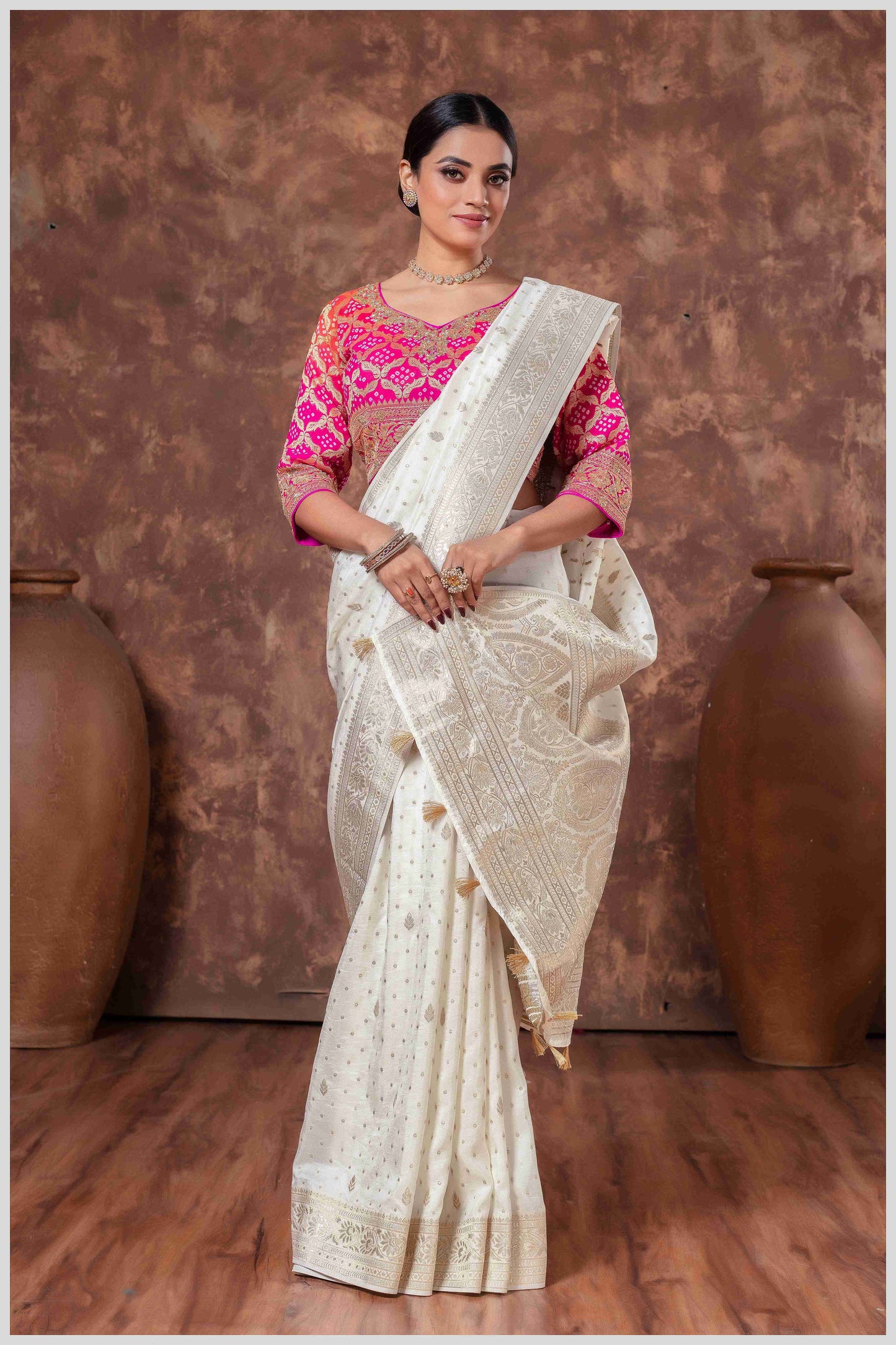 Royal Radiance: Off White Banarasi Saree & Pink Blouse with Silver Zari Detailing