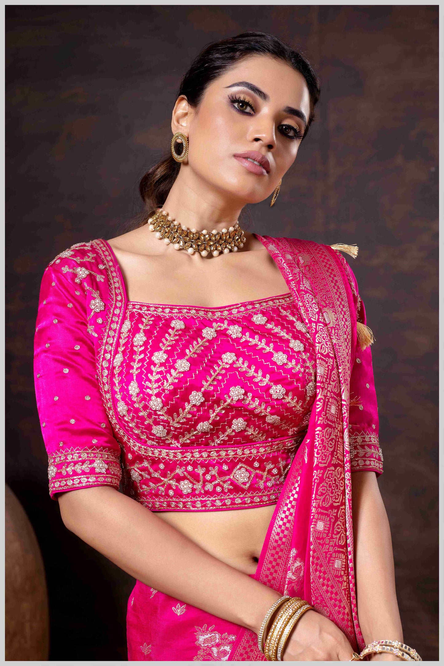Regal Dark Pink Zari Woven Silk Saree with Stitched Designer Blouse.