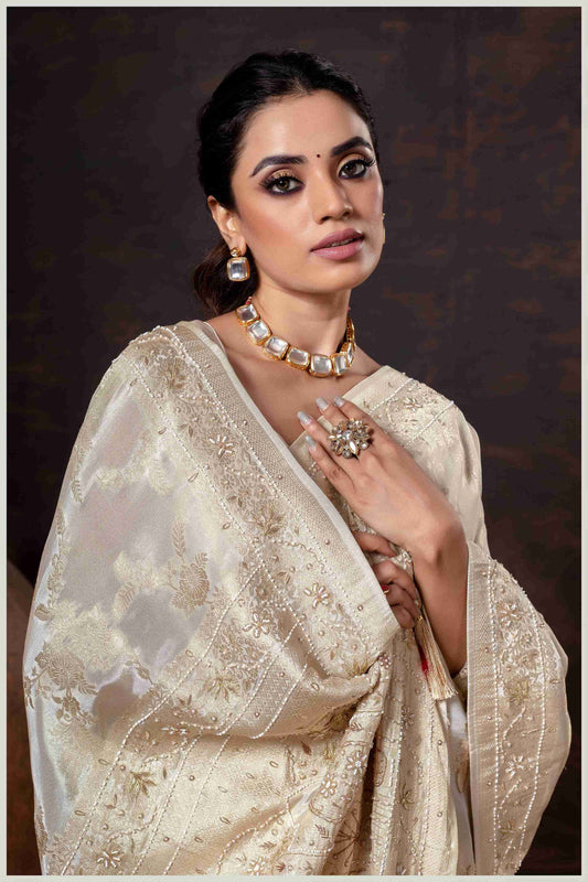 Grace in Bloom: Off White Tissue Saree with Woven Floral Vines