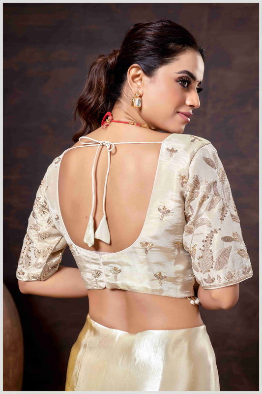 Elegant Off White Designer Tissue Saree with Embellished Blouse.