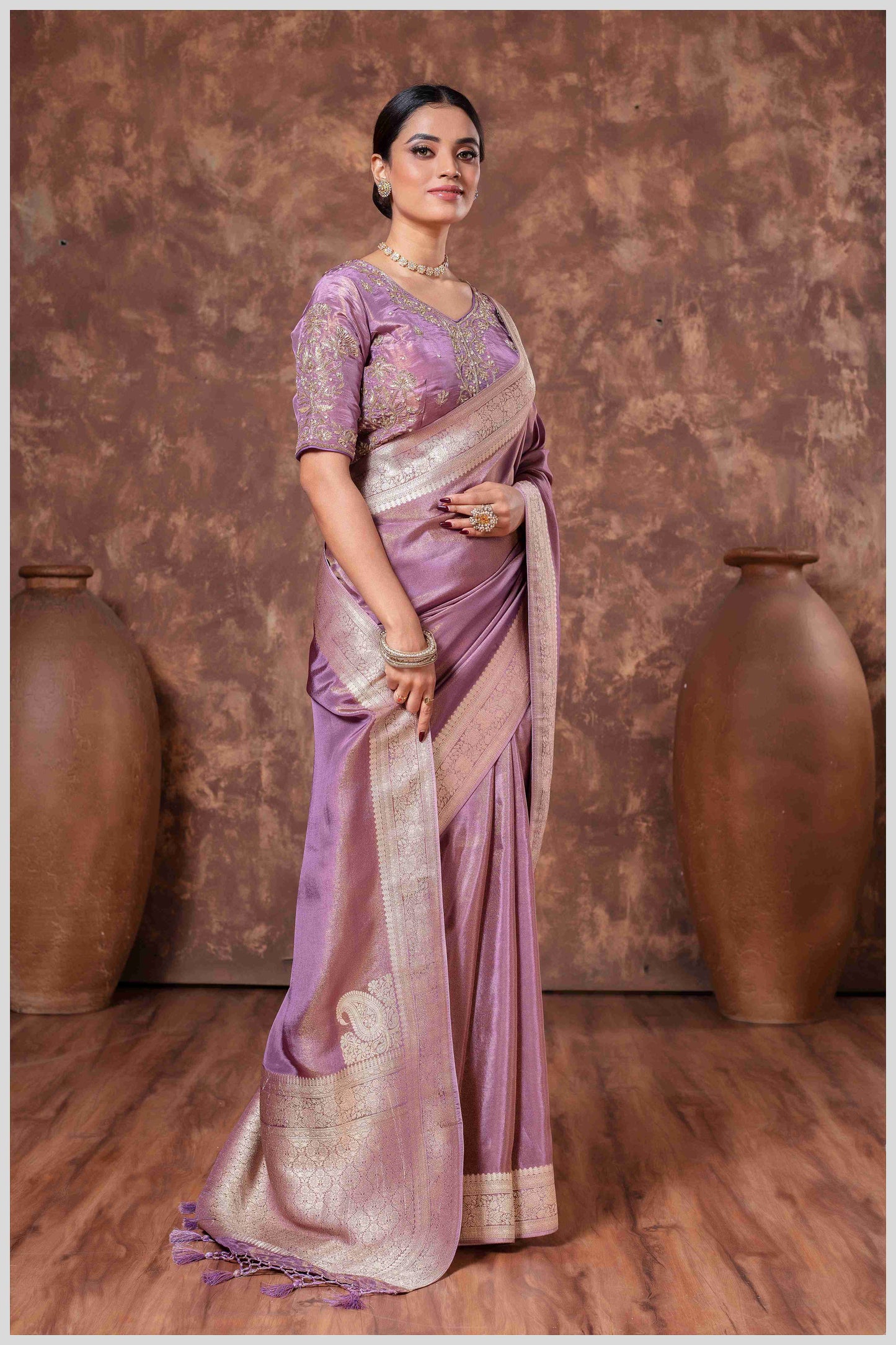 Zari Elegance in Lavender Tissue Saree With Work Blouse.