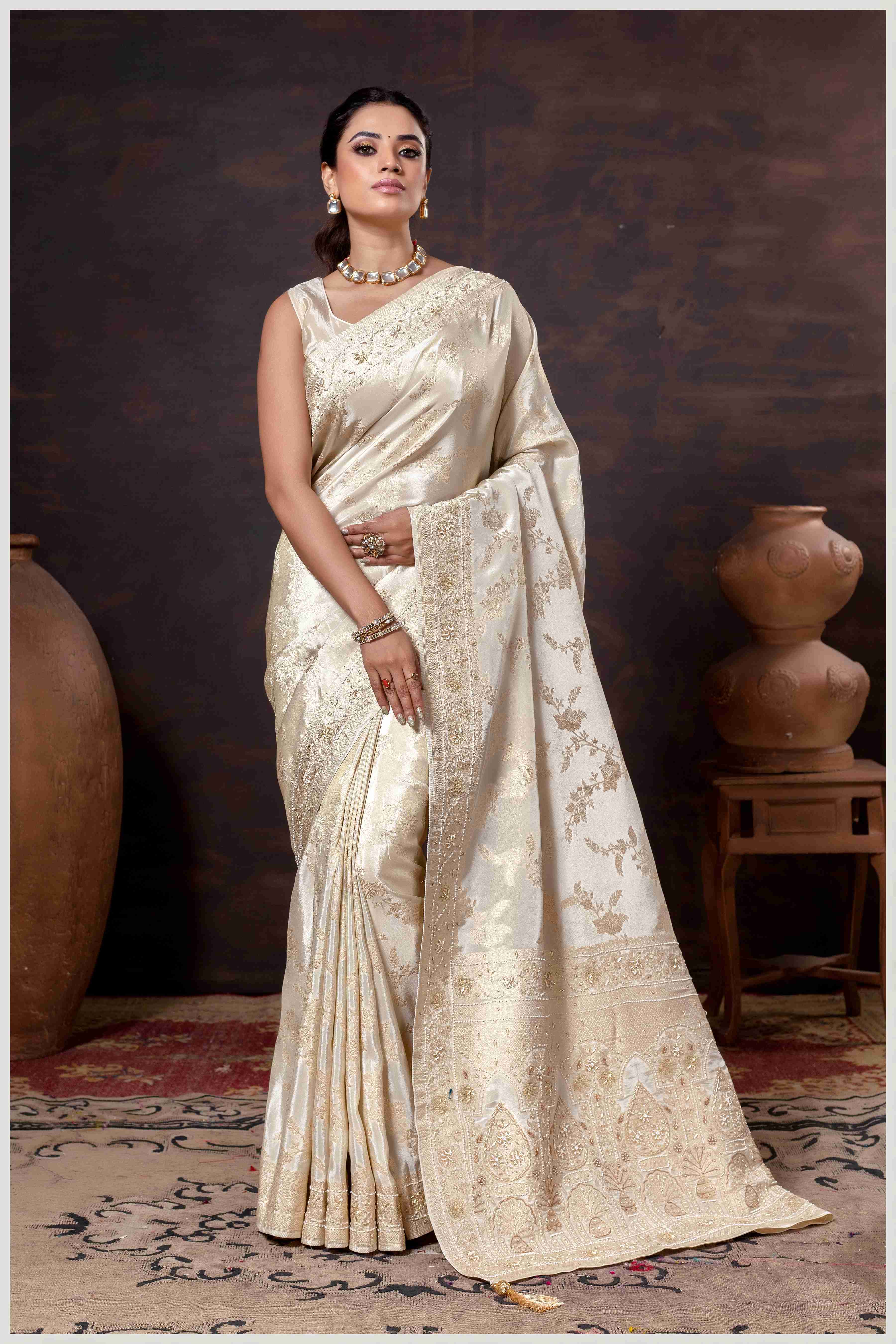 Grace in Bloom: Off White Tissue Saree with Woven Floral Vines