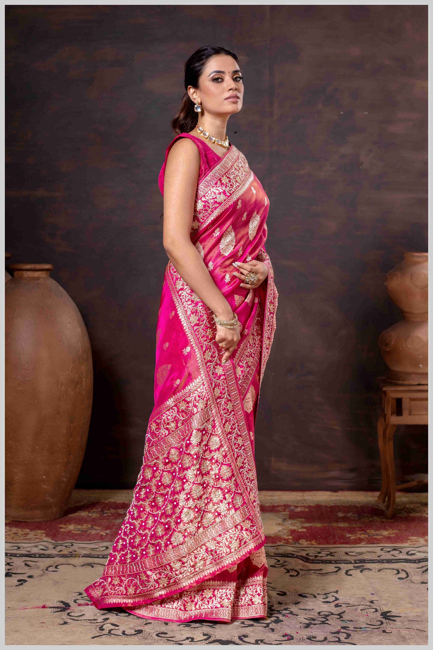 Pink Elegance: Tissue Silk Saree with Gold Zari Woven Details