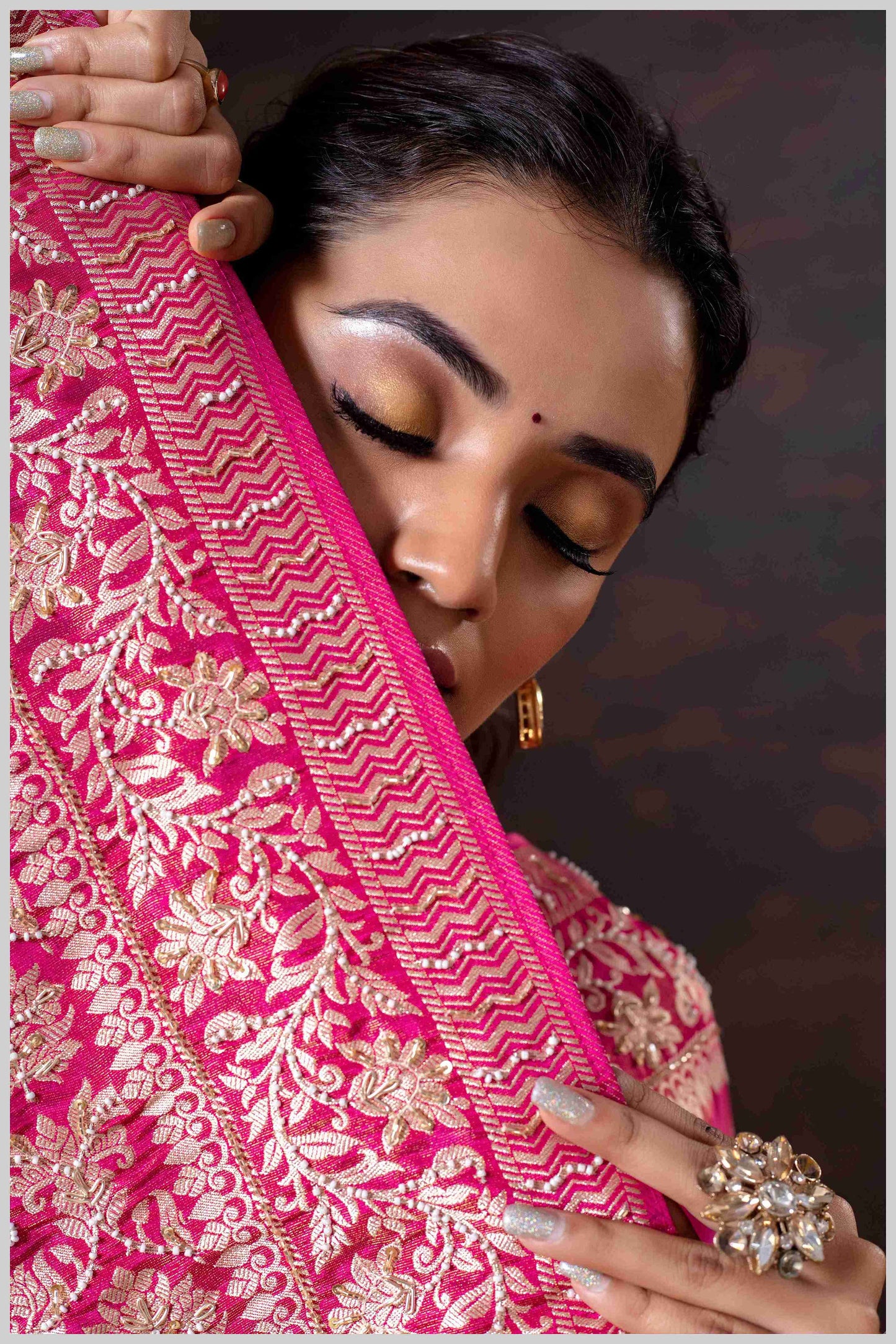 Pink Elegance: Tissue Silk Saree with Gold Zari Woven Details