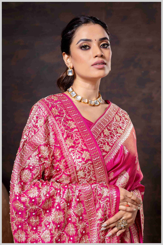 Pink Elegance: Tissue Silk Saree with Gold Zari Woven Details