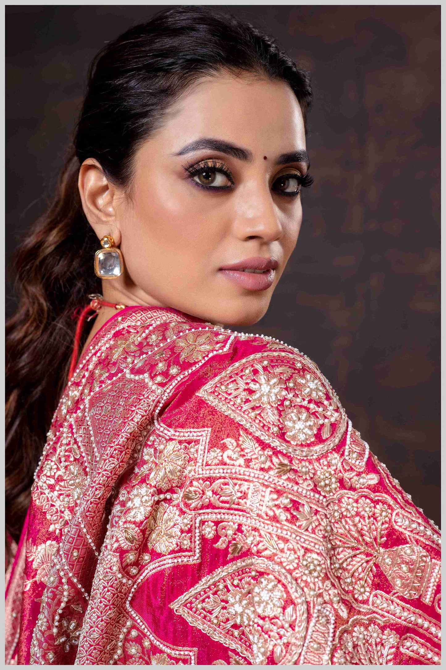 Grace in Bloom: Dark Pink Tissue Saree with Woven Floral Vines