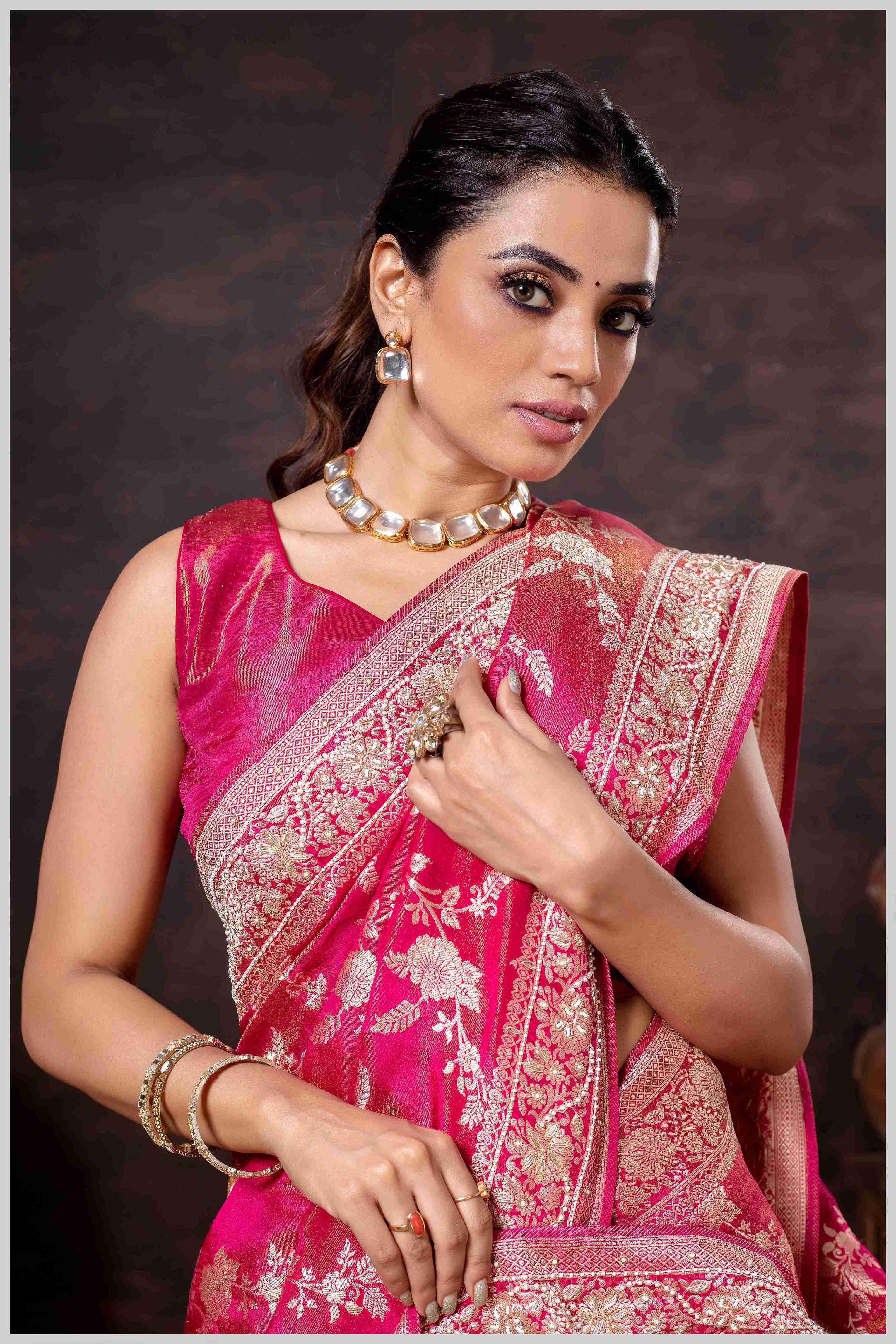 Grace in Bloom: Dark Pink Tissue Saree with Woven Floral Vines